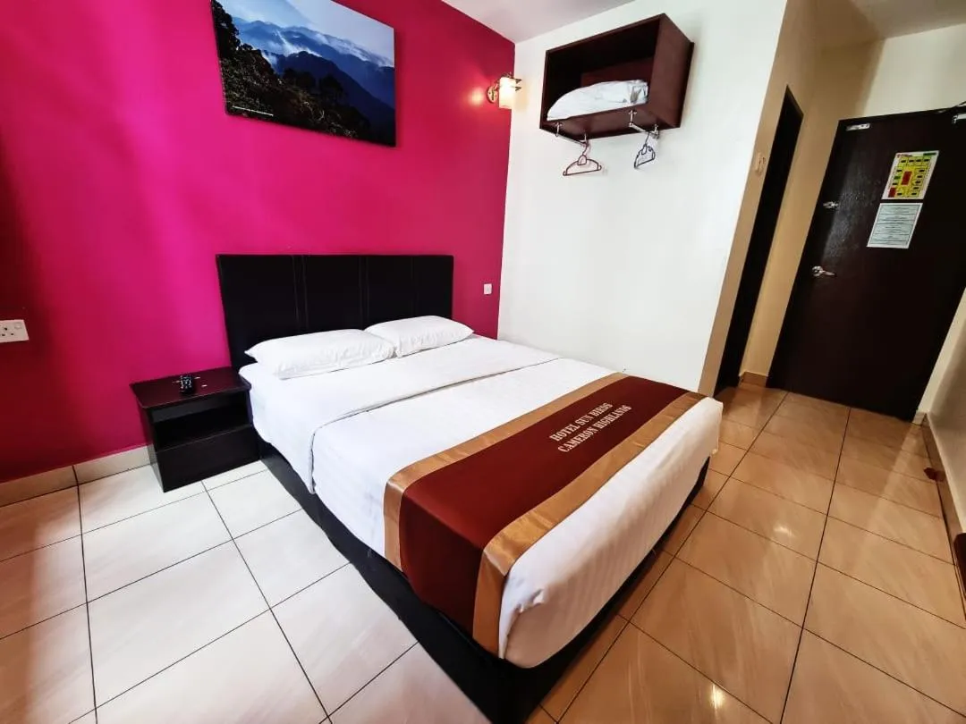 Bed in Hotel Sun Birds