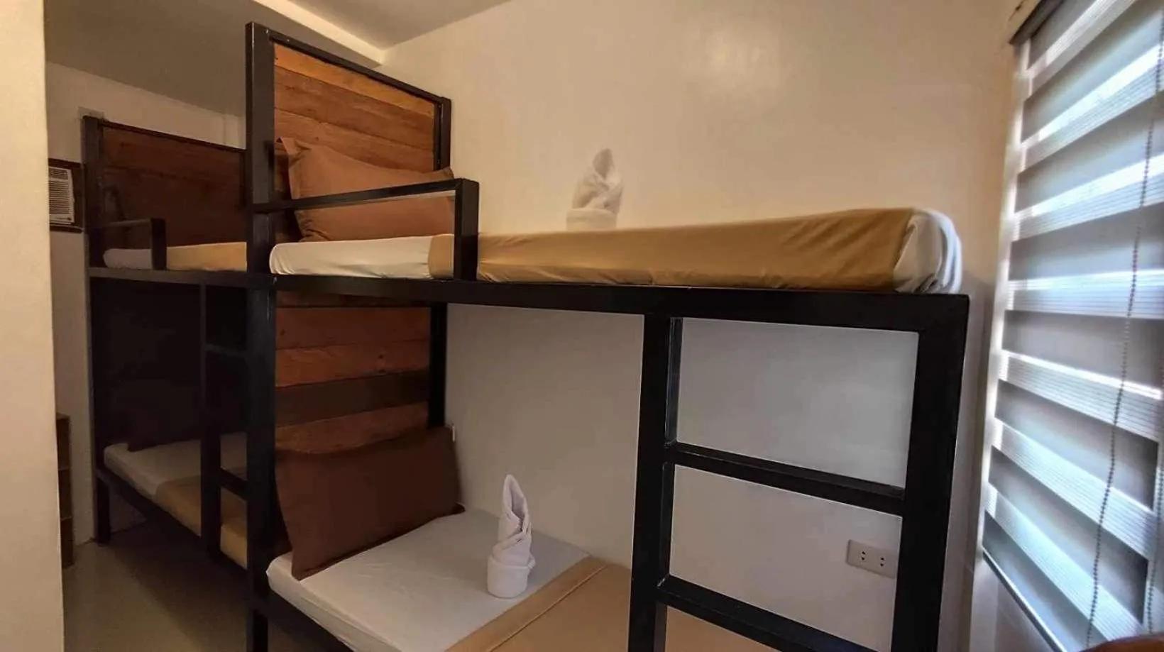 Bed in Prim Travellers Inn