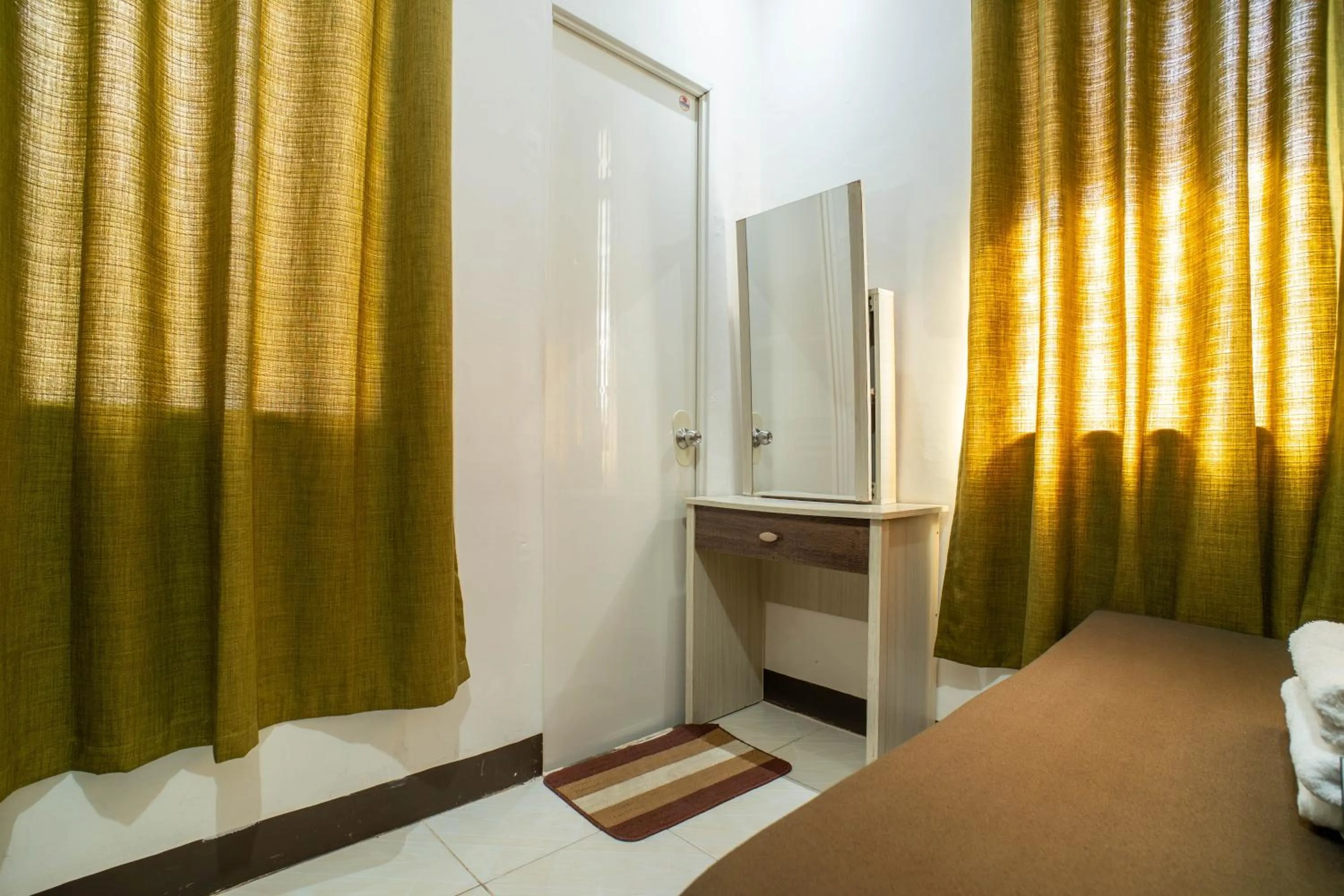 Bed in Prim Travellers Inn