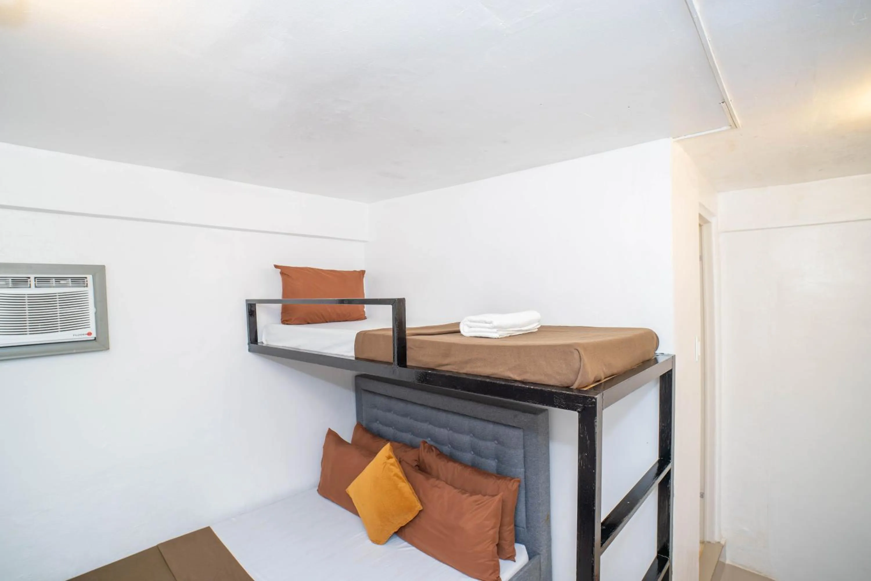 Bed in Prim Travellers Inn