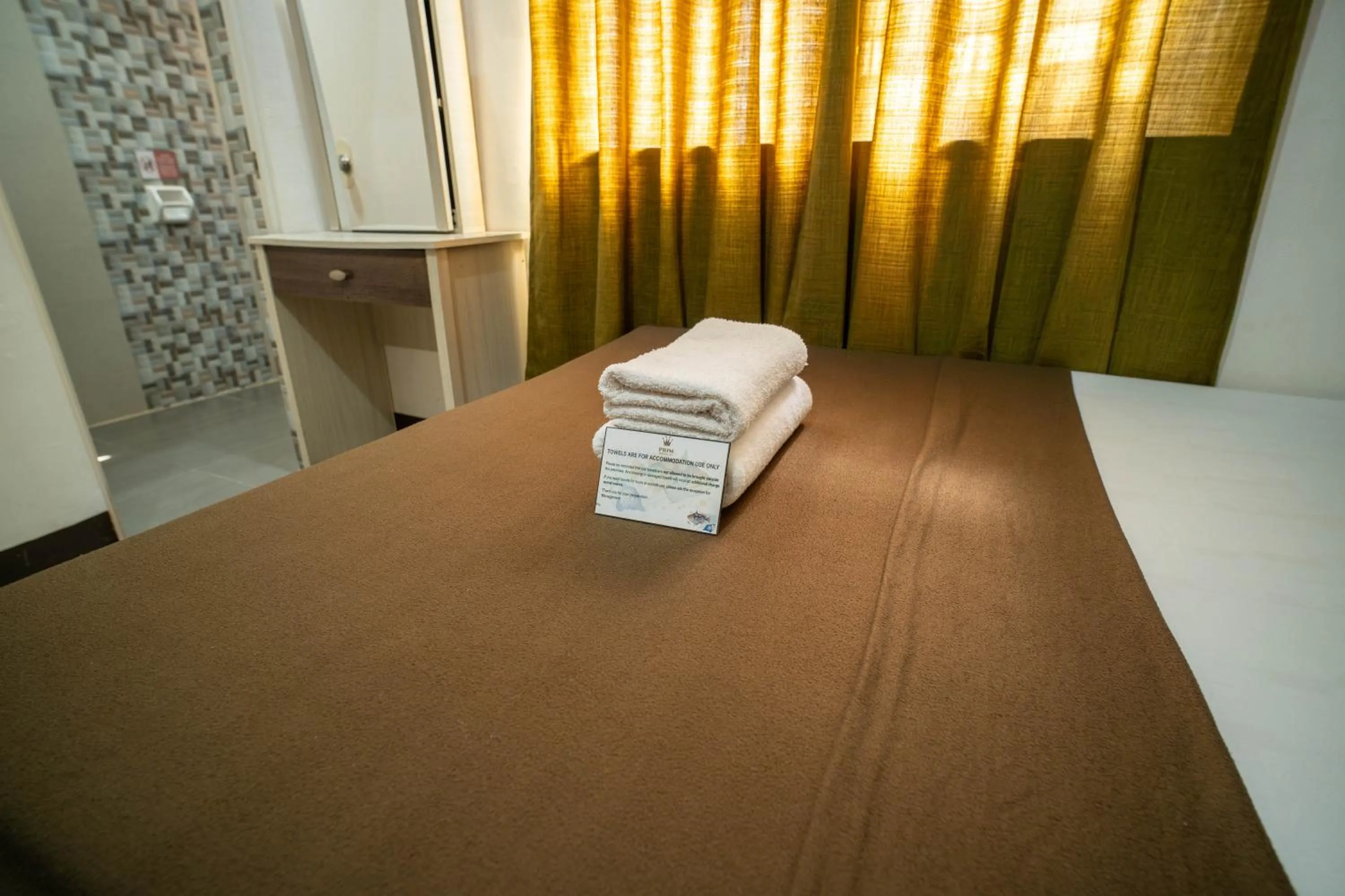 Bed in Prim Travellers Inn