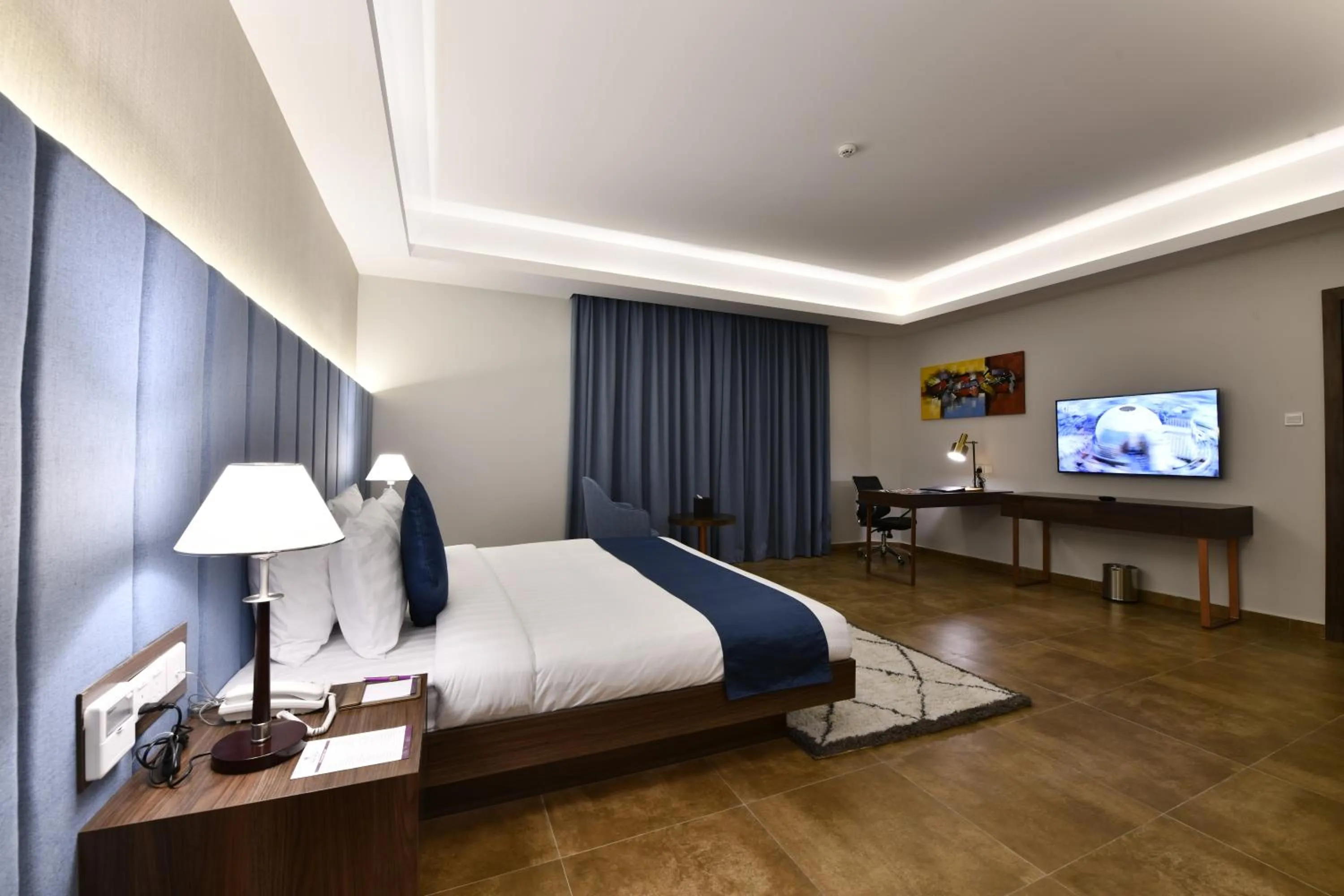 Bed in JUFFAIR BOULEVARD HOTEL & SUITES