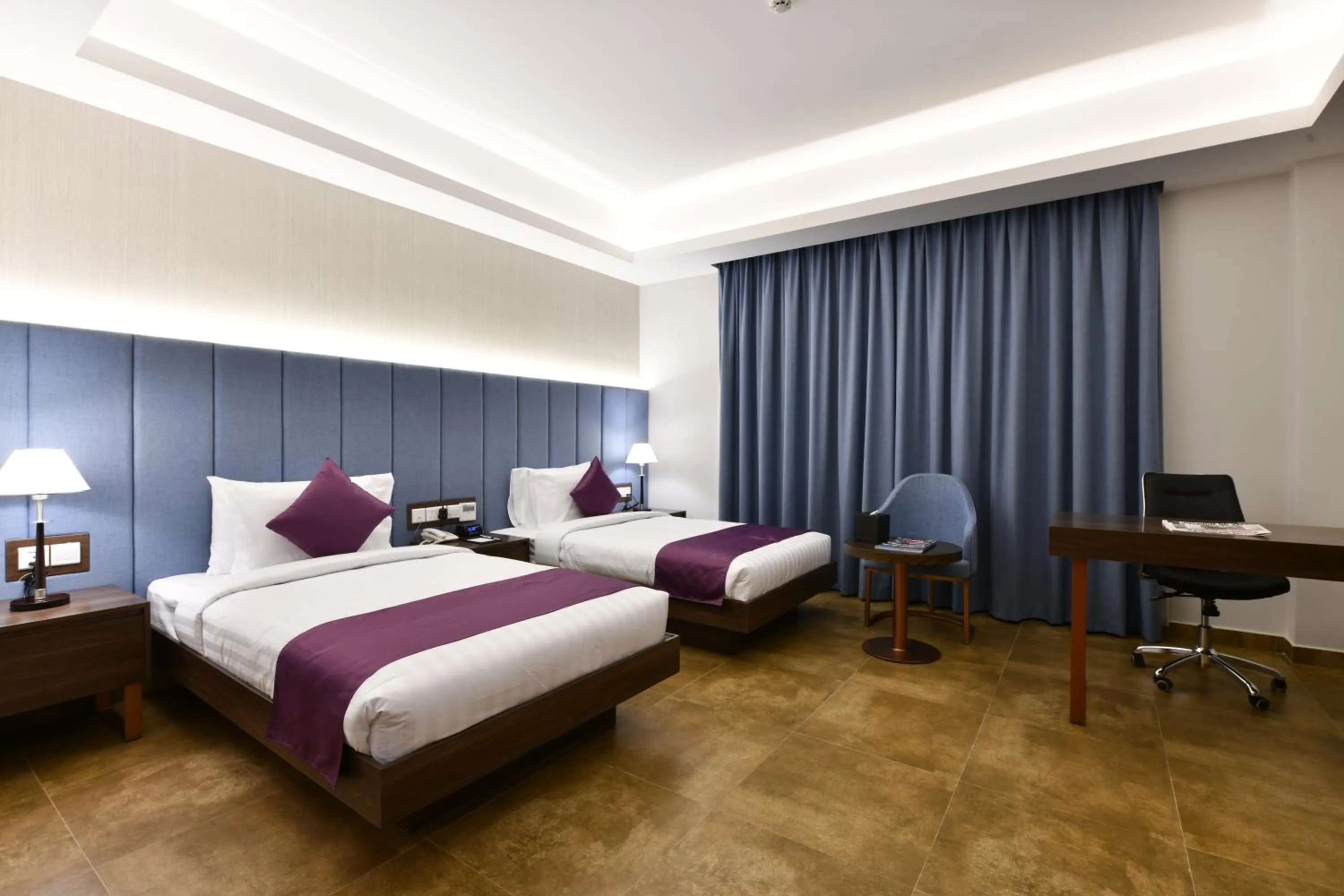 Bed in JUFFAIR BOULEVARD HOTEL & SUITES