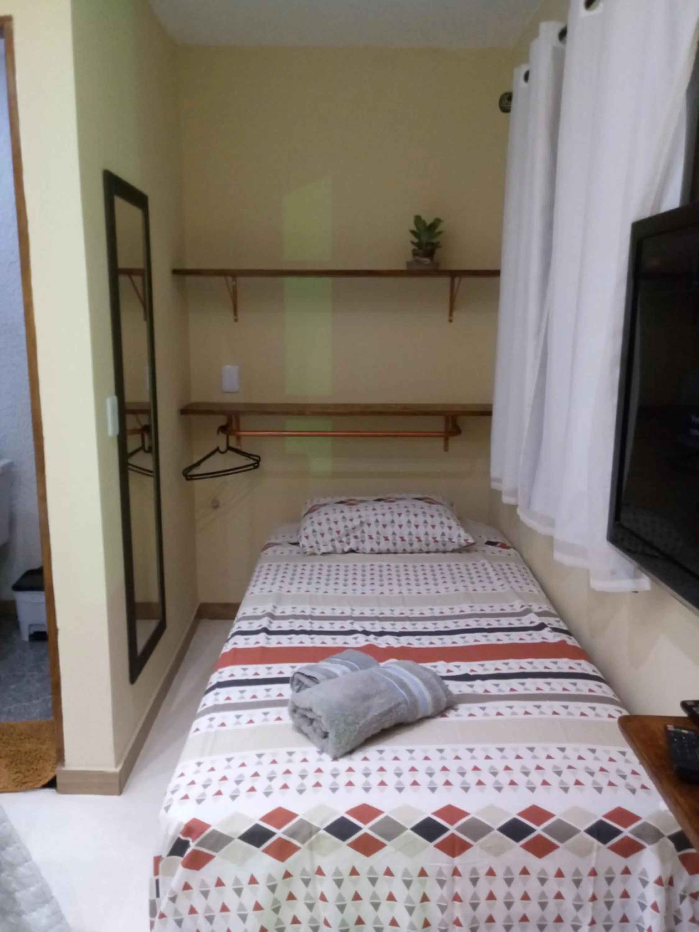 Bed in Chalés Pôr do Sol Gostoso