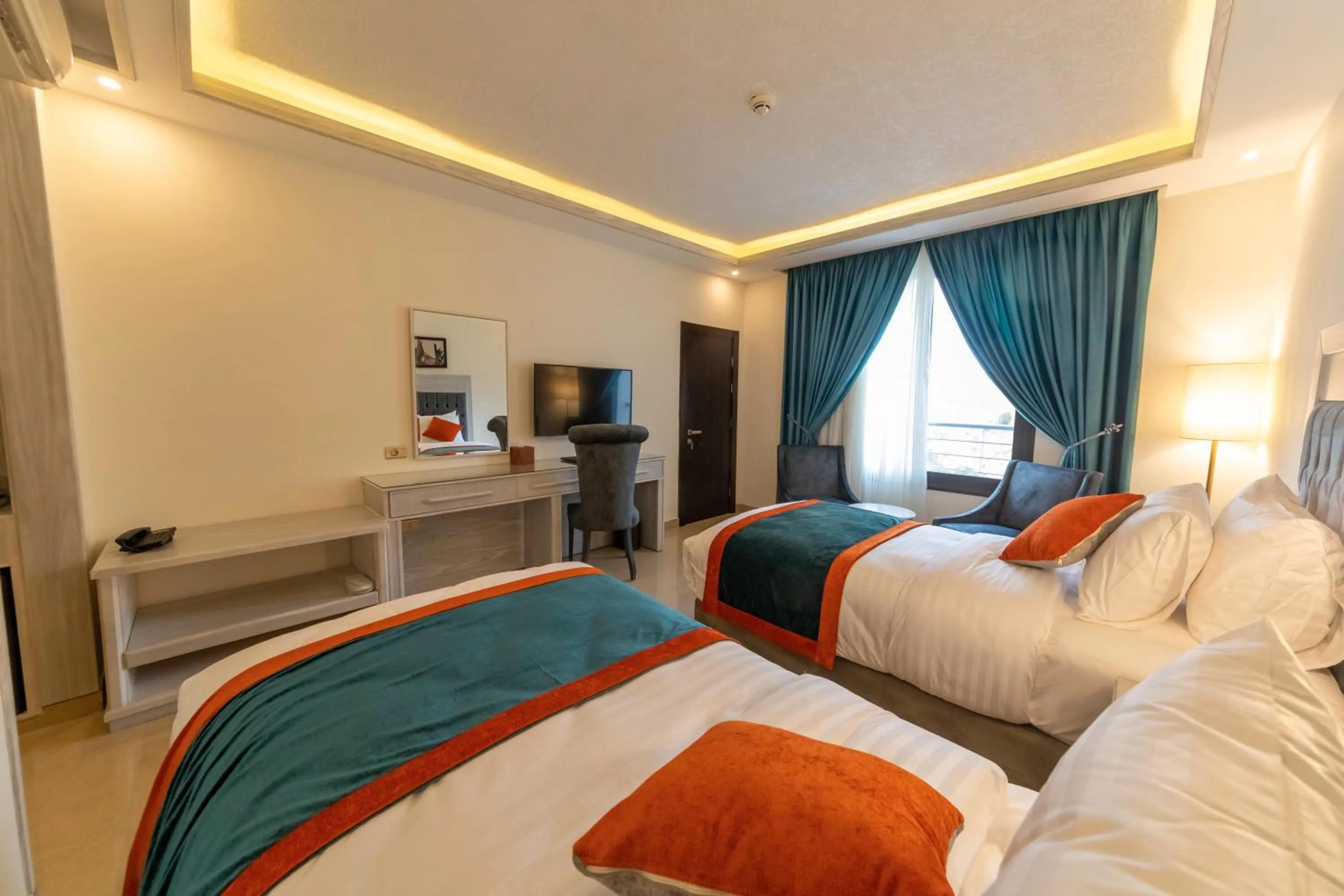 Bed in Petra Canyon Hotel