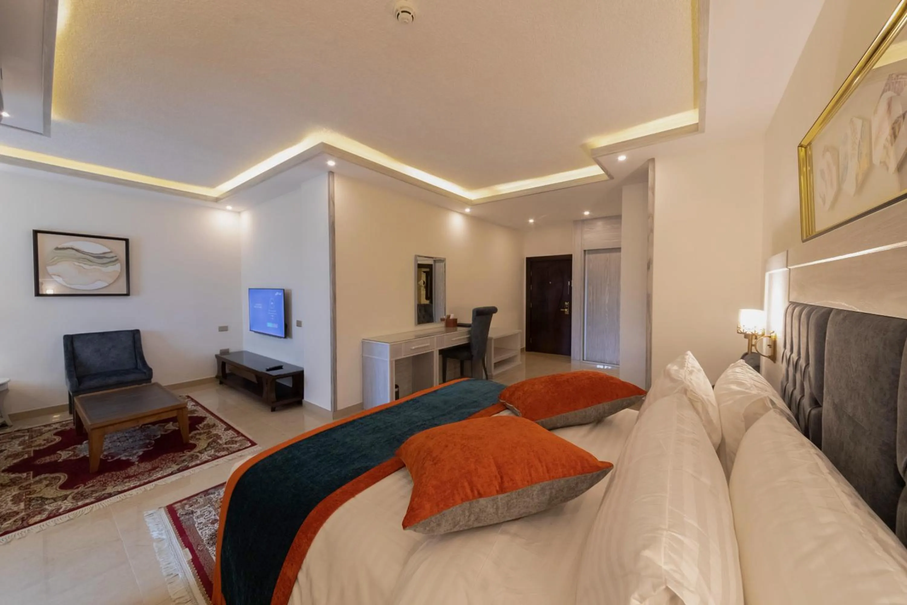 Seating area, Bed in Petra Canyon Hotel