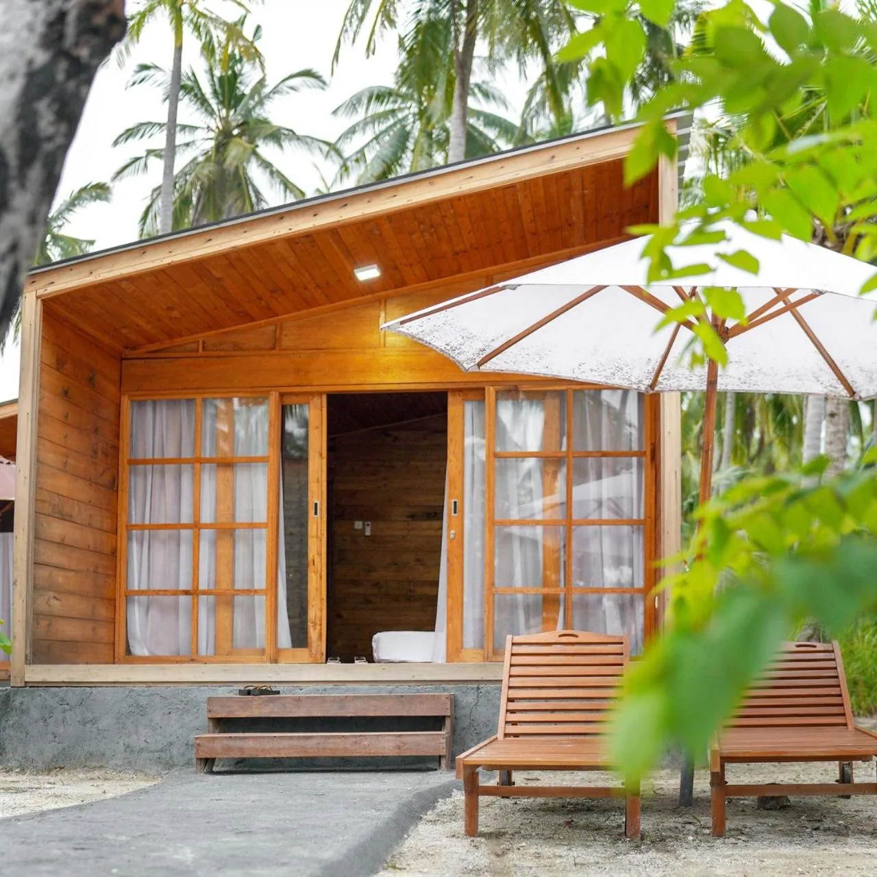 Property building in Pulau Mahitam Resort & Cottage by Hotelku
