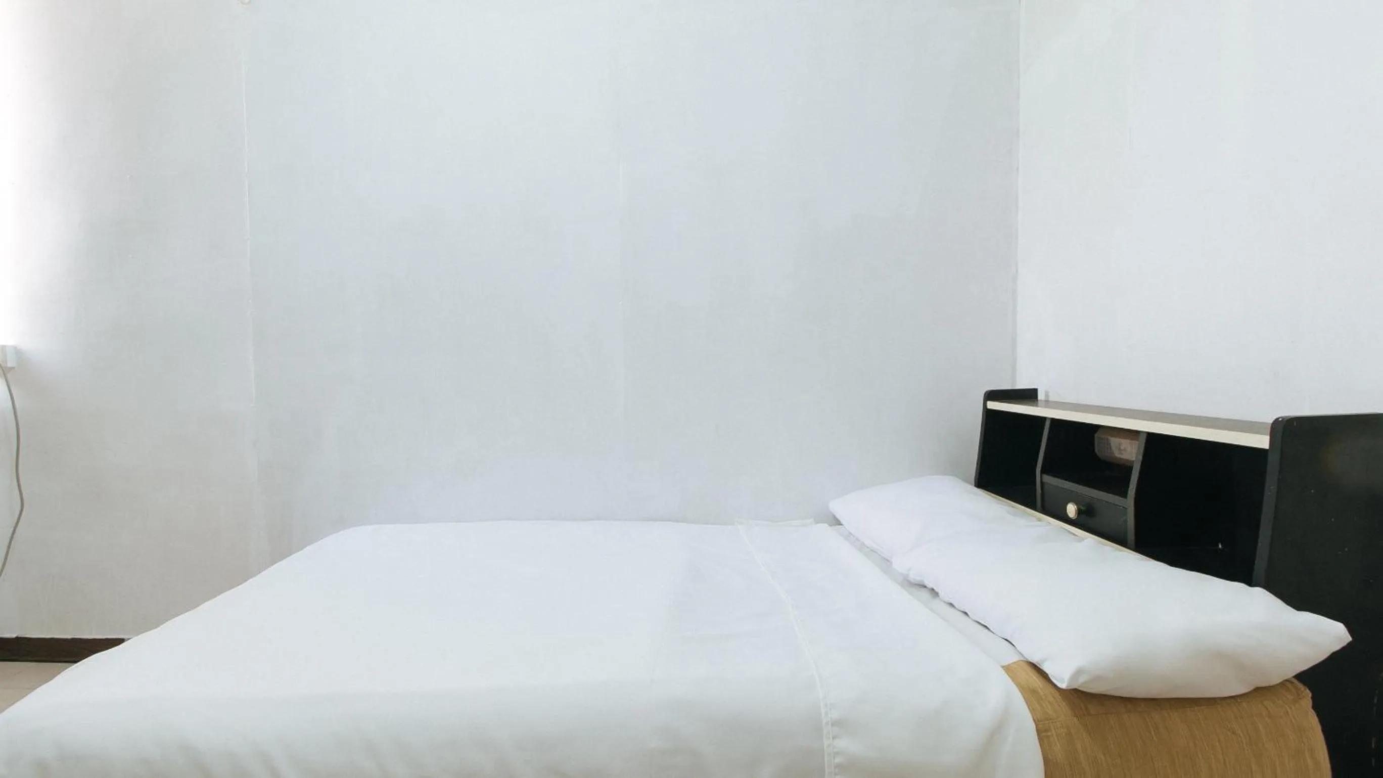 Photo of the whole room, Bed in Cristian Jay Dormitory by RedDoorz