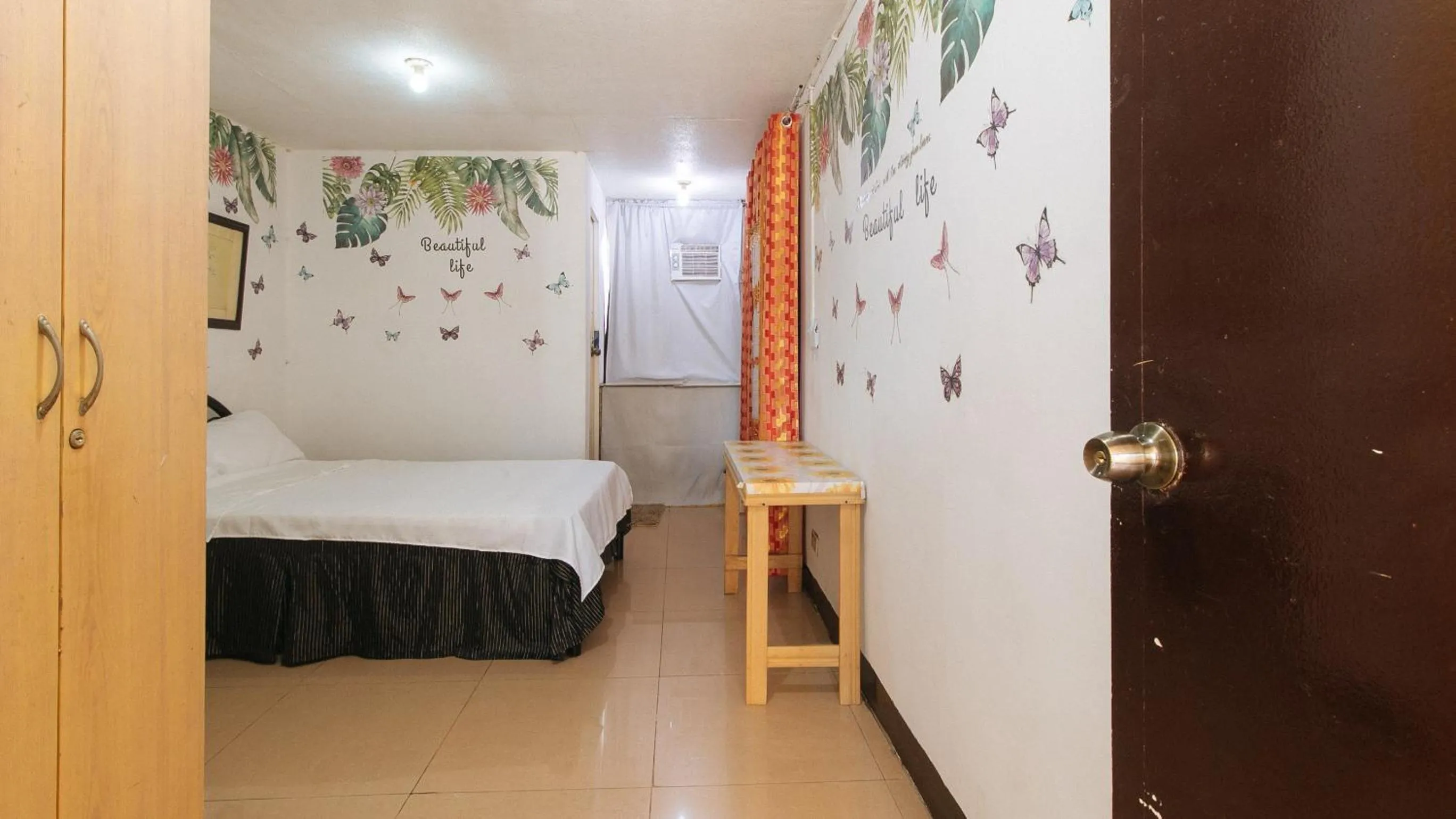 Photo of the whole room, Bed in Cristian Jay Dormitory by RedDoorz