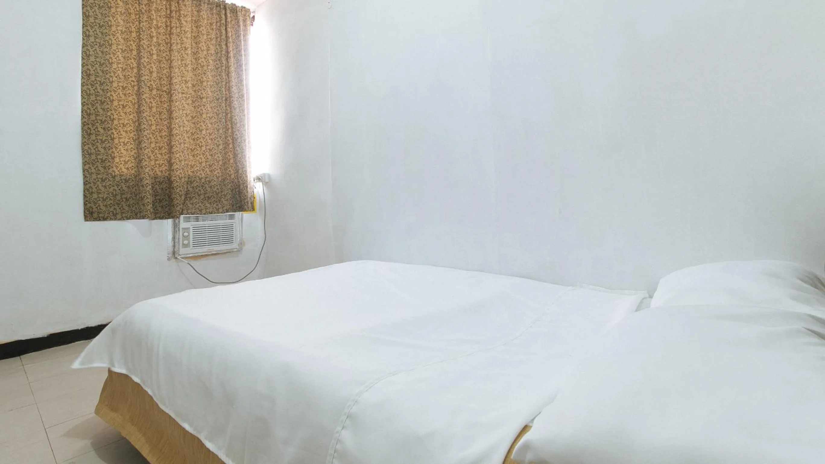 Photo of the whole room, Bed in Cristian Jay Dormitory by RedDoorz