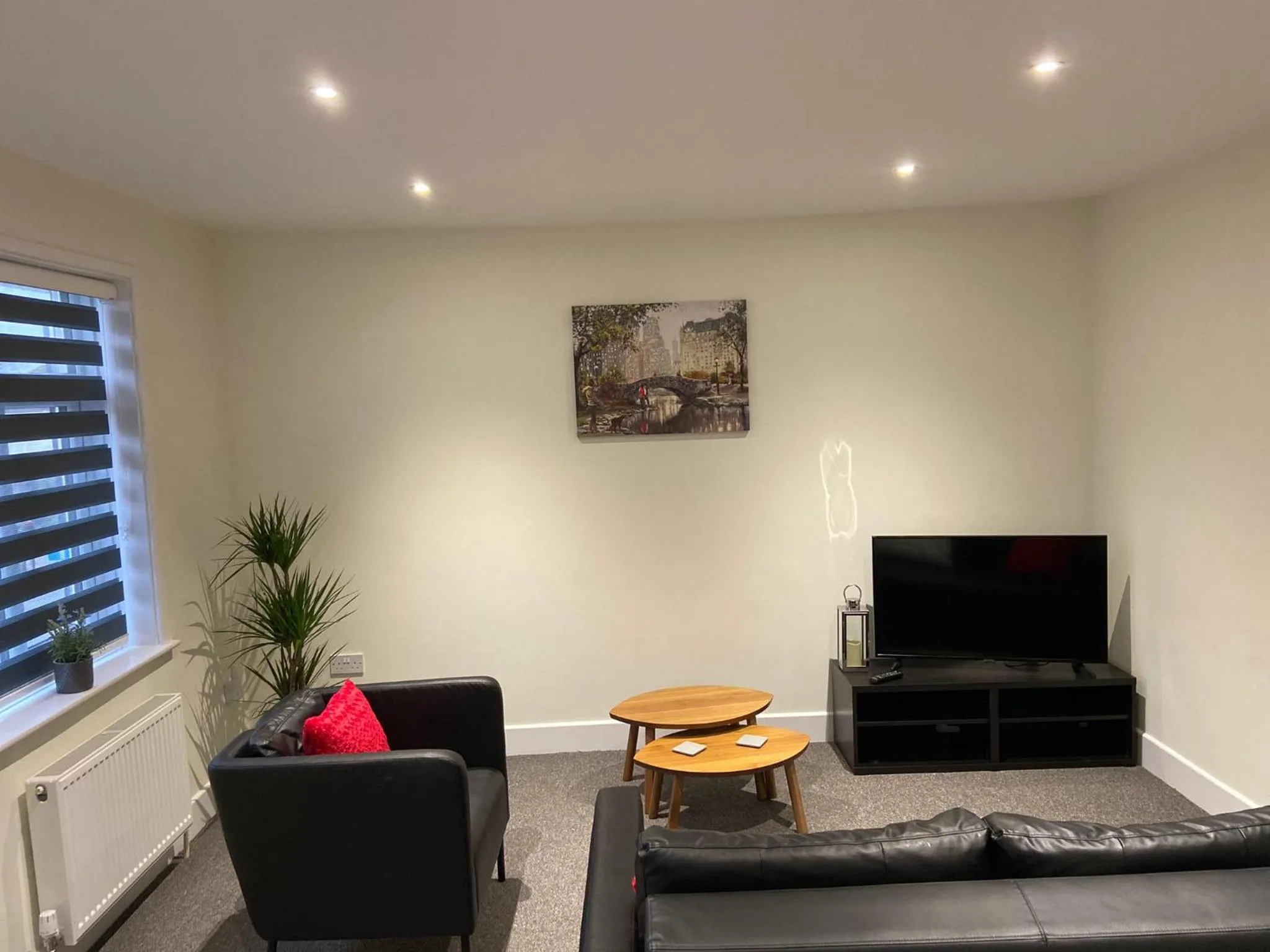 Living room in Gladstone Apartments by Bluebell Rooms