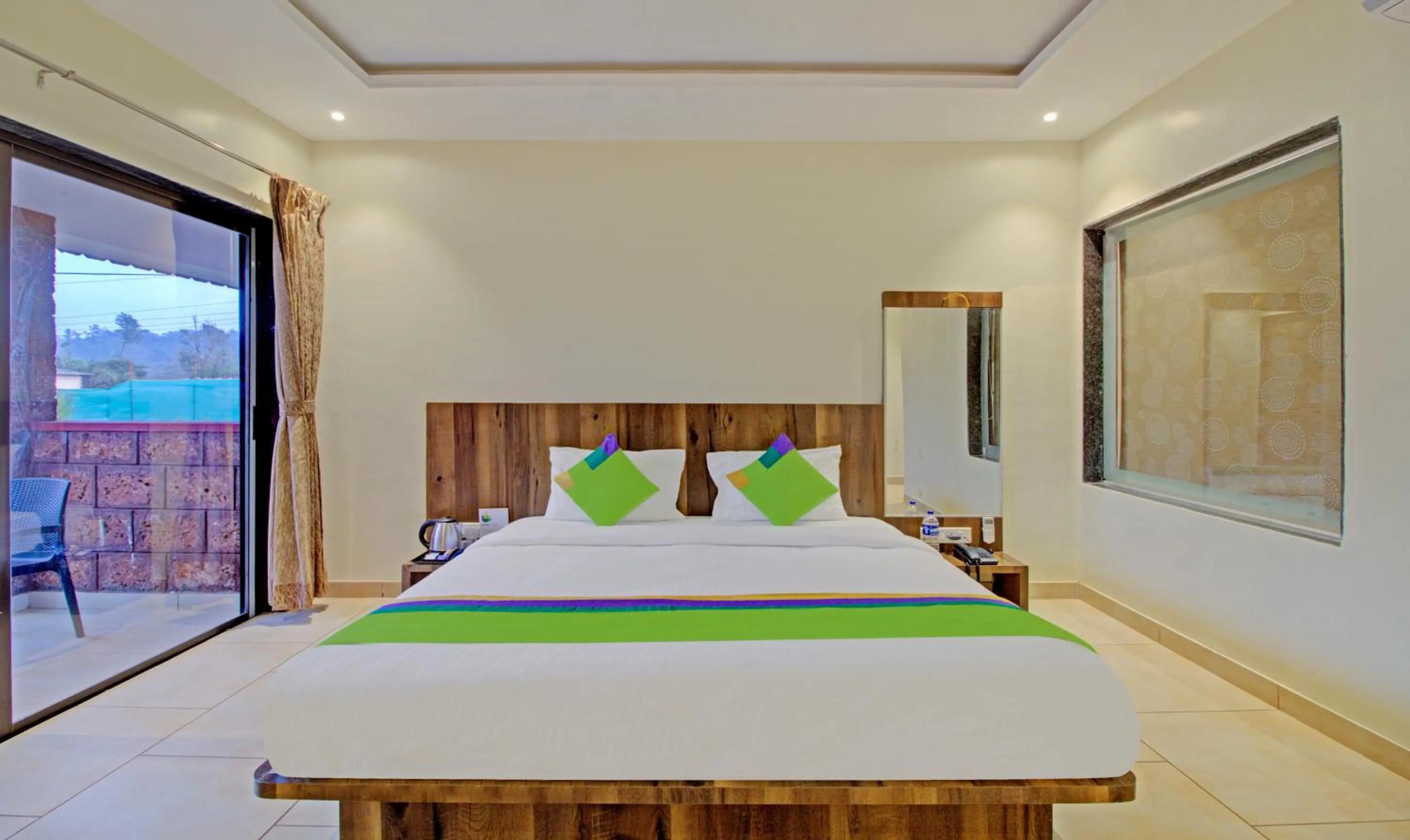 Bedroom, Bed in Treebo Nakshatra Cottages Mahabaleshwar
