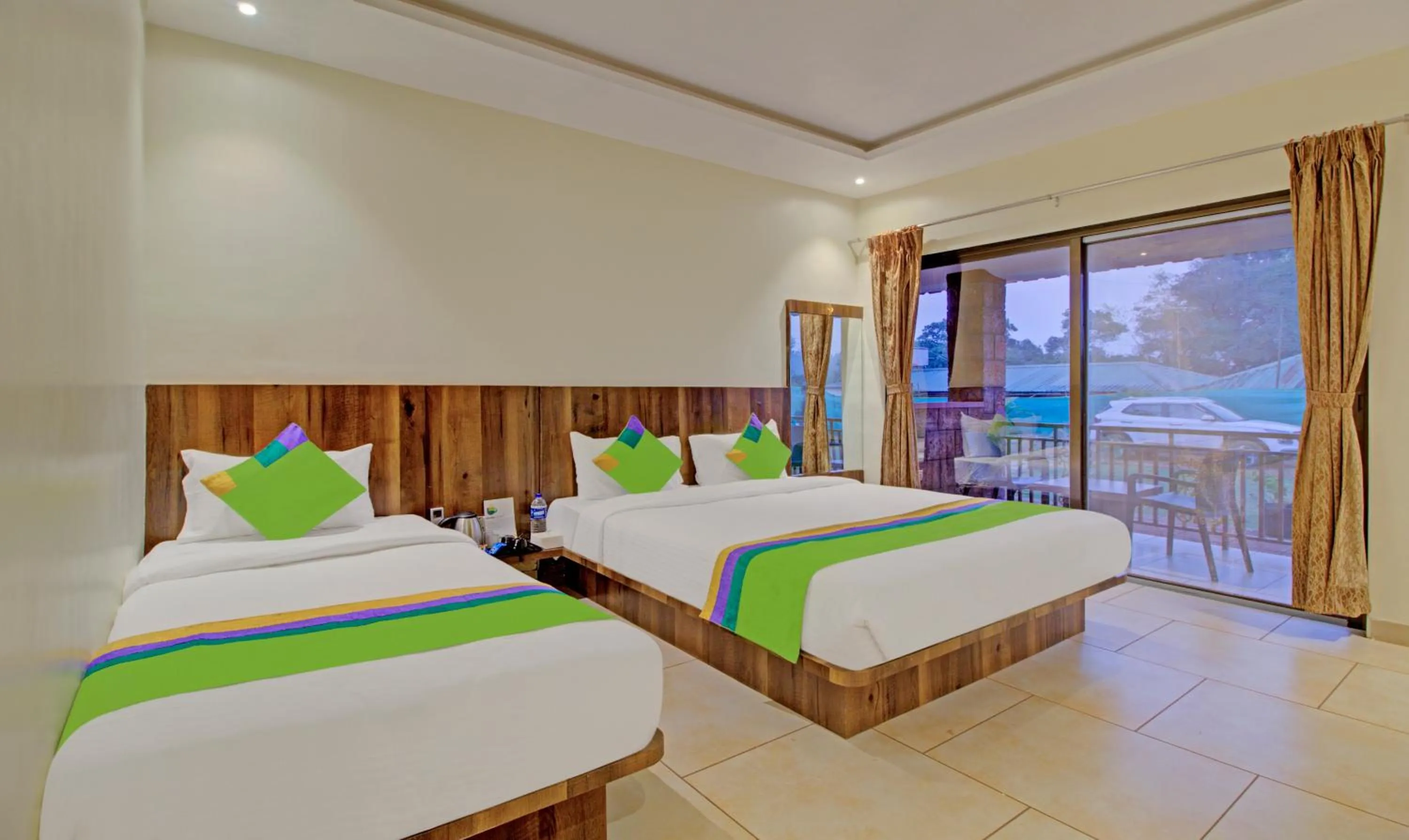 Bedroom, Bed in Treebo Nakshatra Cottages Mahabaleshwar