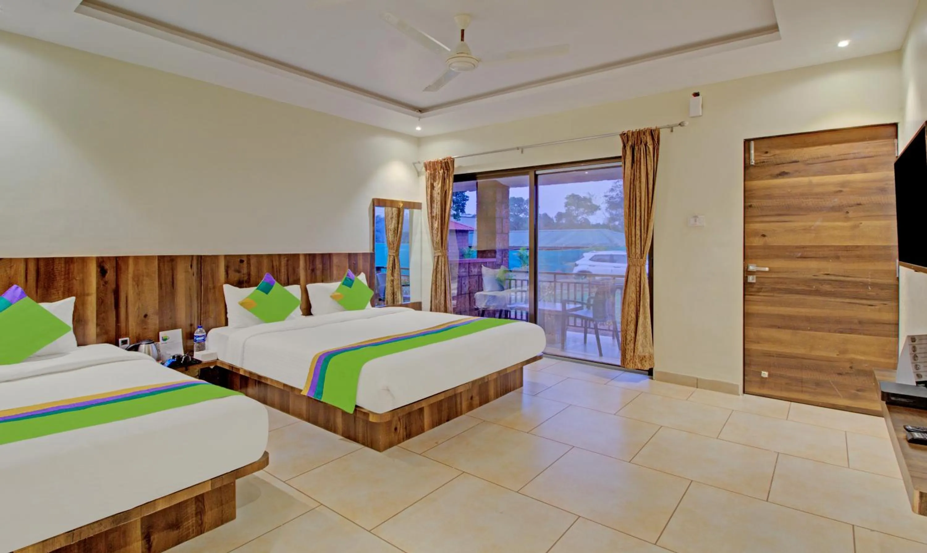Bedroom, Bed in Treebo Nakshatra Cottages Mahabaleshwar