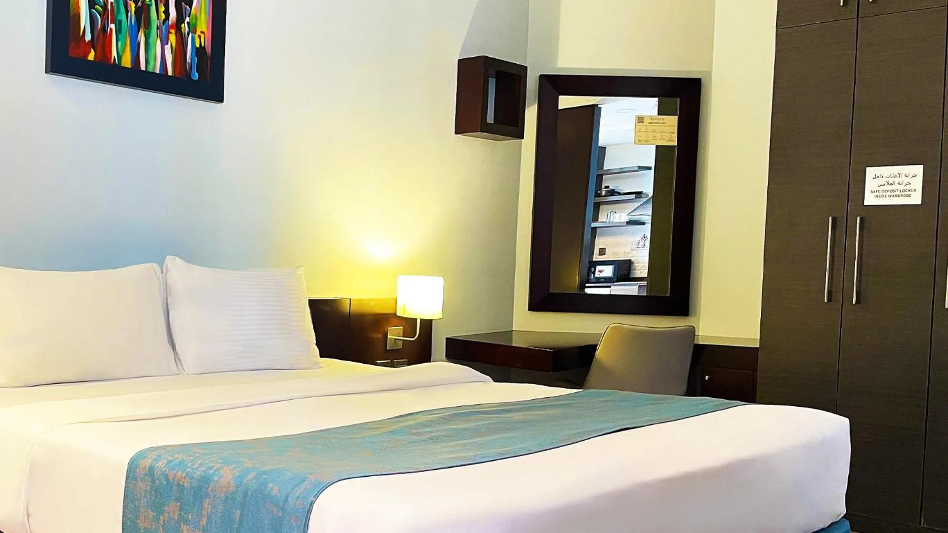 Bed in Signature Hotel Apartments and Spa