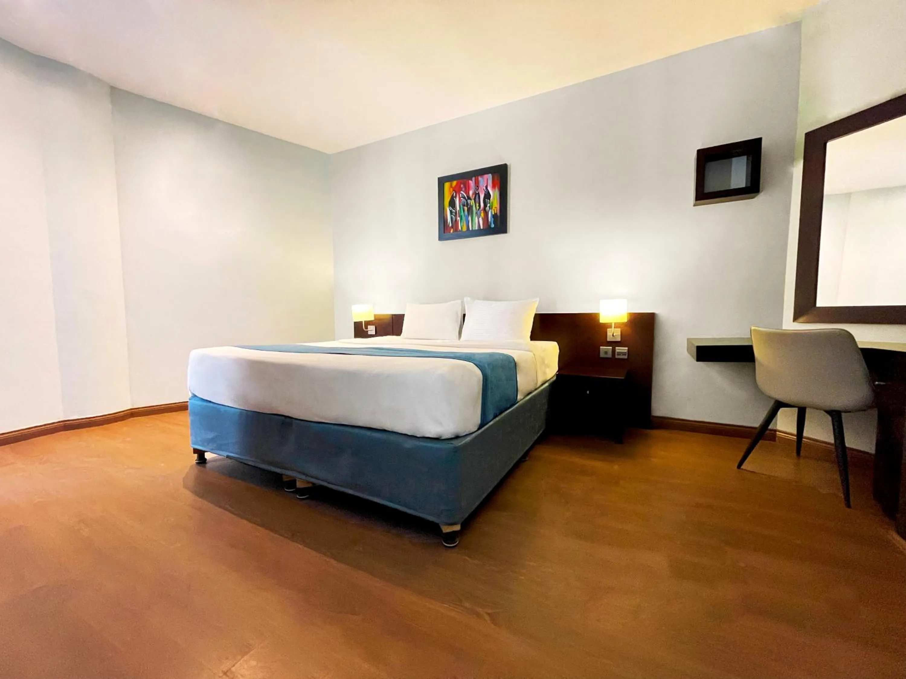 Bed in Signature Hotel Apartments and Spa