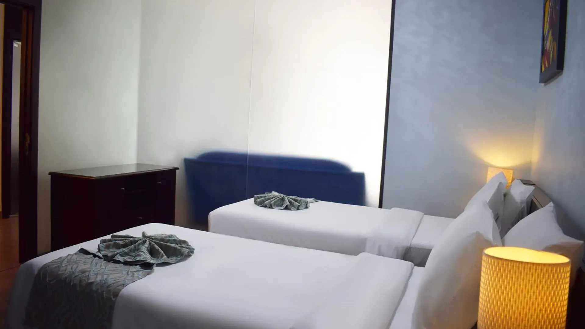 Bed in Signature Hotel Apartments and Spa Bed in Signature Hotel Apartments and Spa