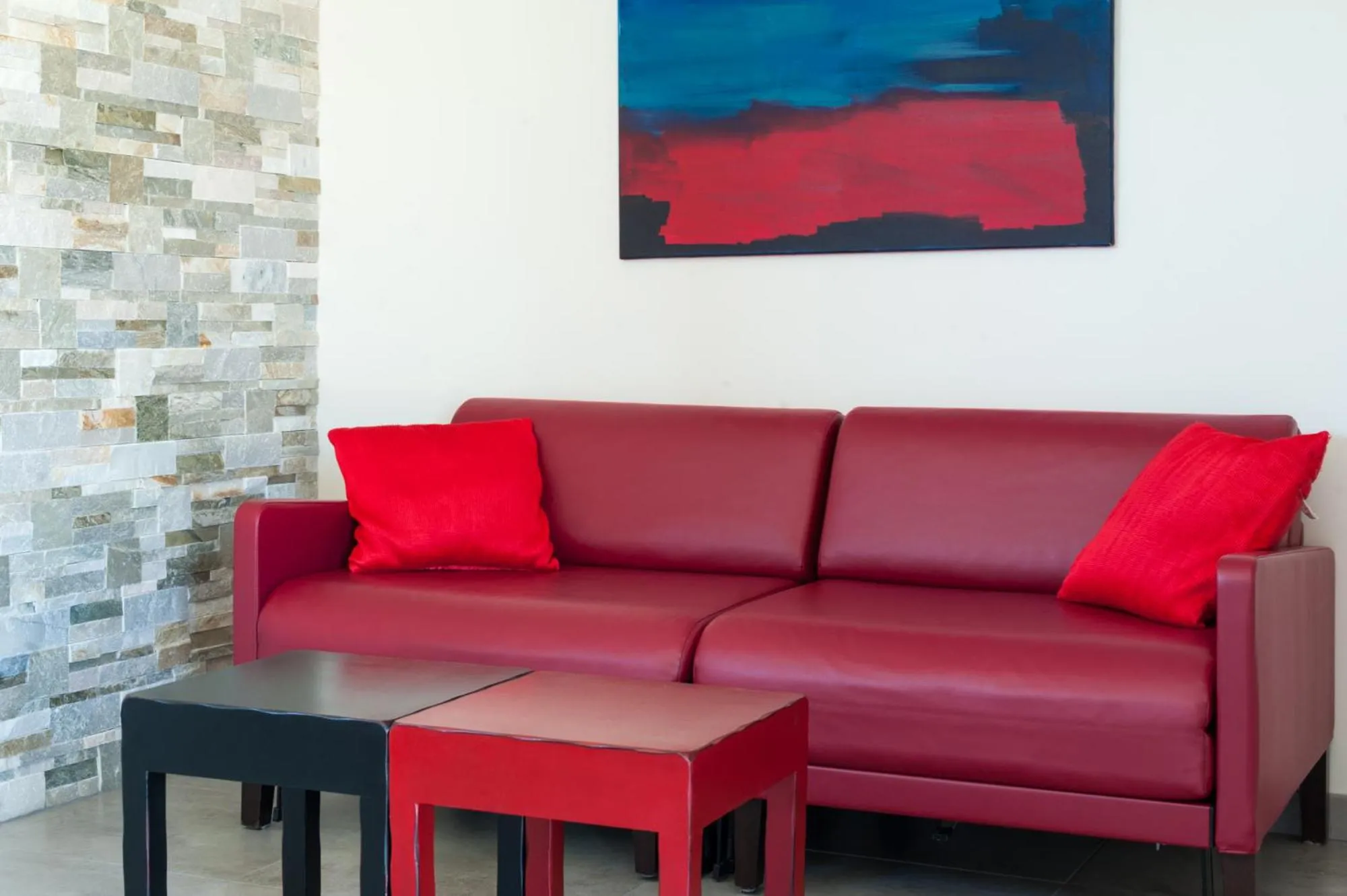 Living room in Le Pigeonnier du Perron Hôtel