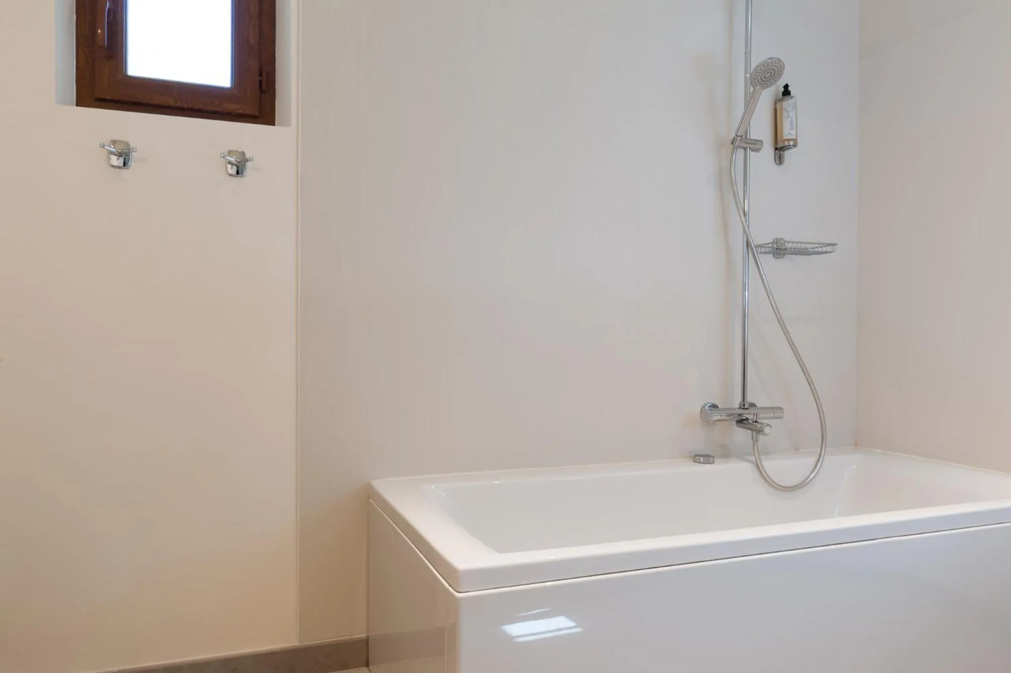 Bathroom in Le Pigeonnier du Perron Hôtel