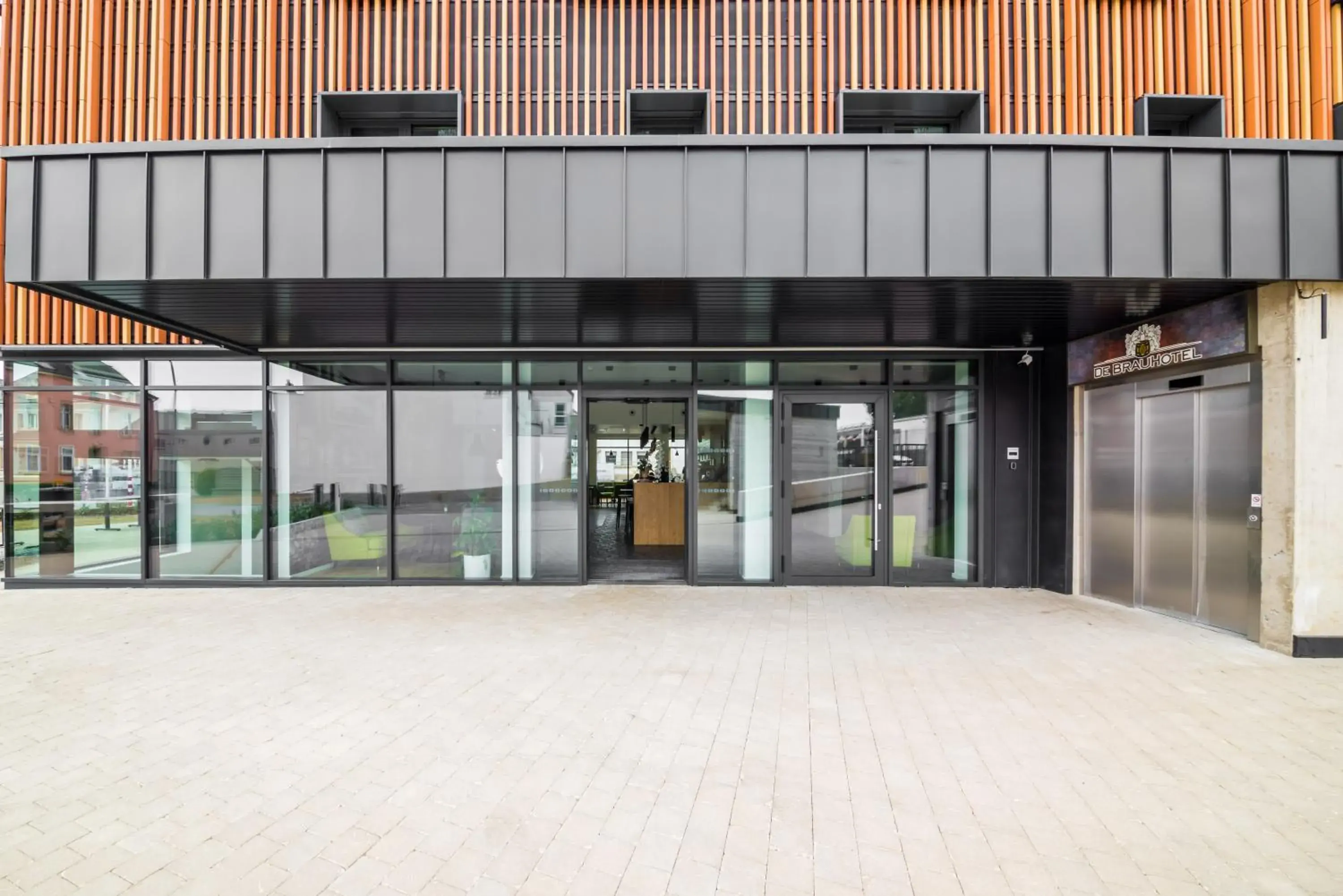 Property building in De Brauhotel - Hôtel de la Brasserie Nationale Property building in De Brauhotel - Hôtel de la Brasserie Nationale