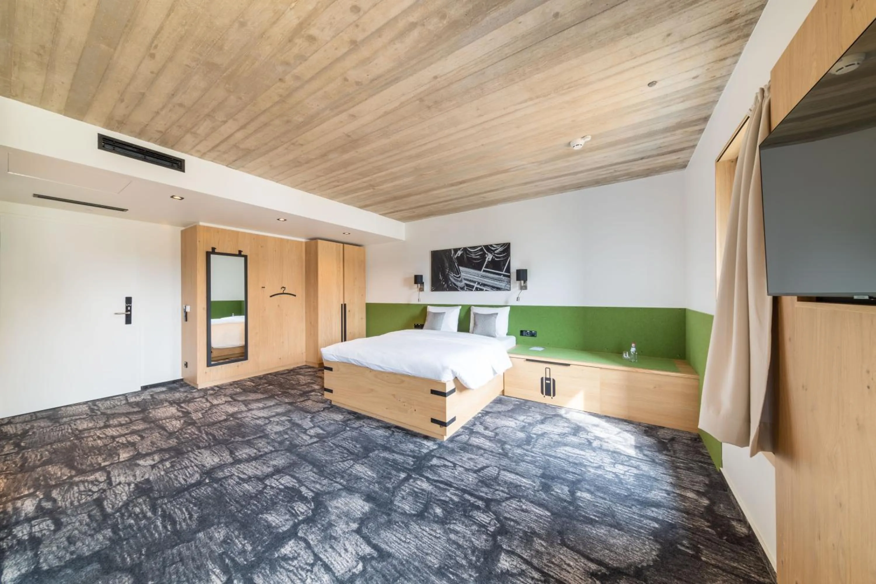 Bed in De Brauhotel - Hôtel de la Brasserie Nationale