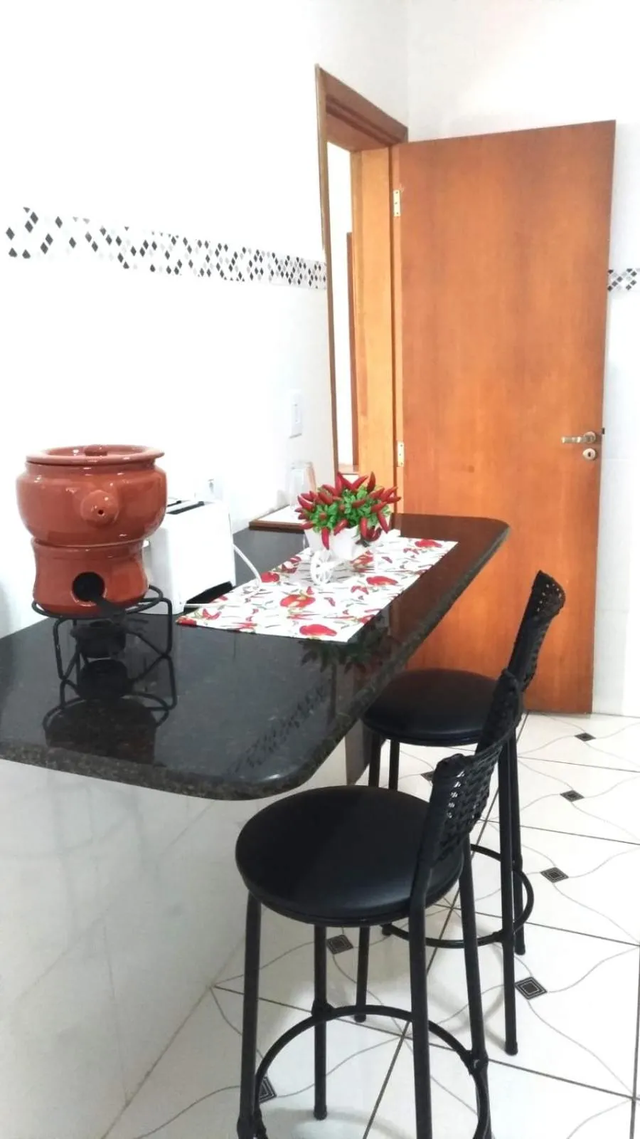 Communal kitchen in Pousada Montanha da Pedra Grande