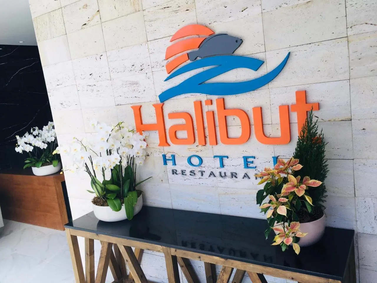Property logo or sign in Halibut Hotel