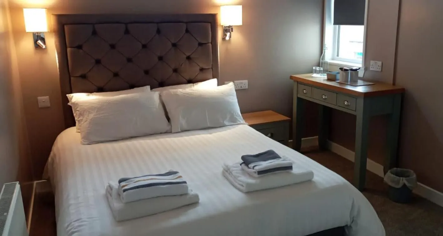 Bed in The Skye Bridge Hotel