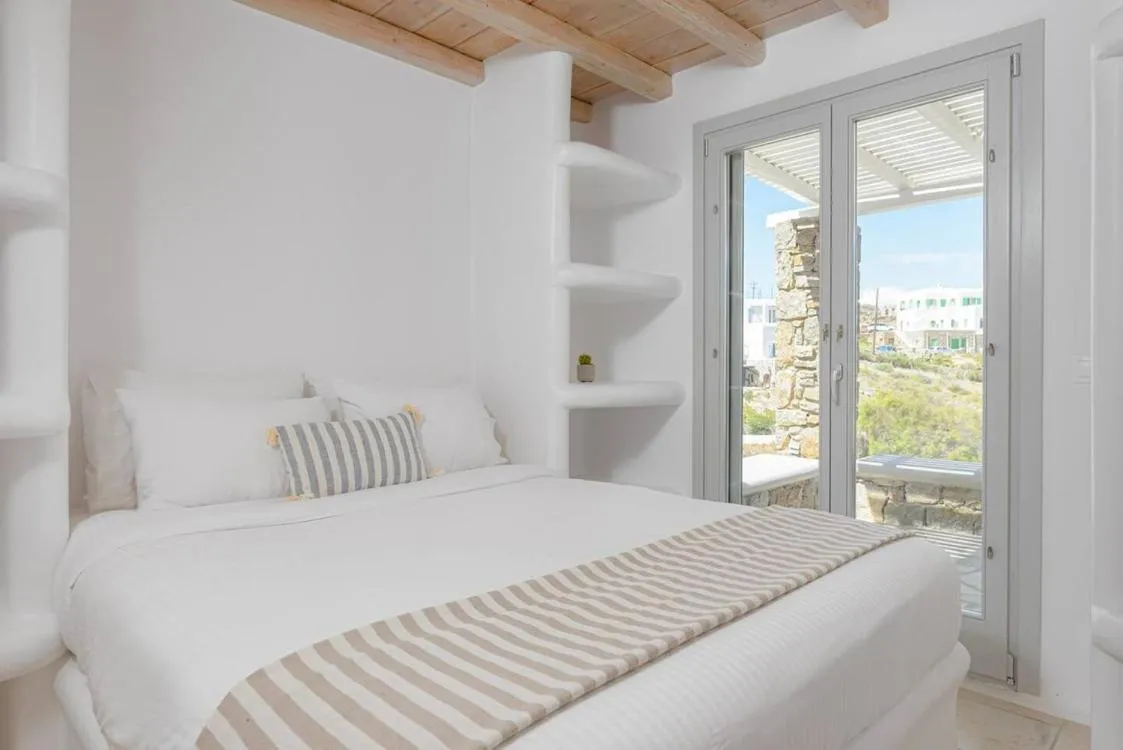 Bed in Koumi Homes Mykonos