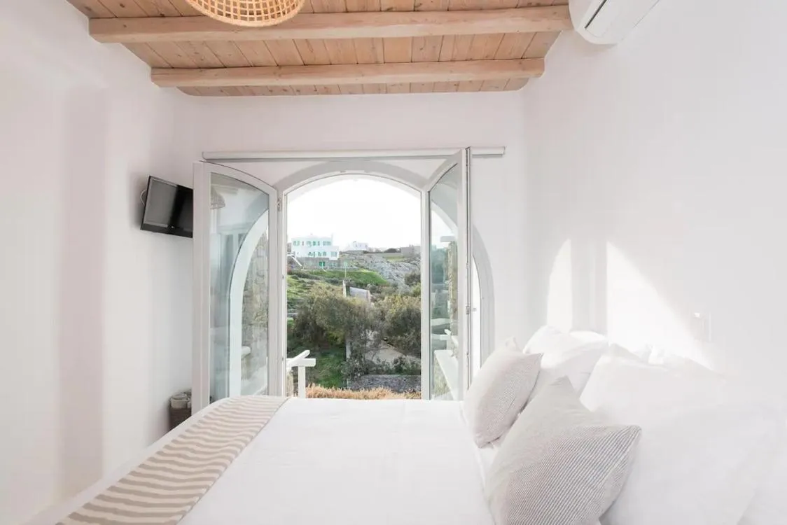 Bed in Koumi Homes Mykonos