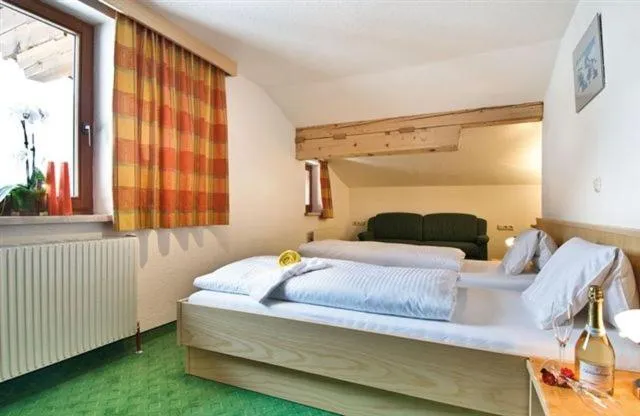 Bed in "Quality Hosts Arlberg" Hotel-Gasthof Freisleben