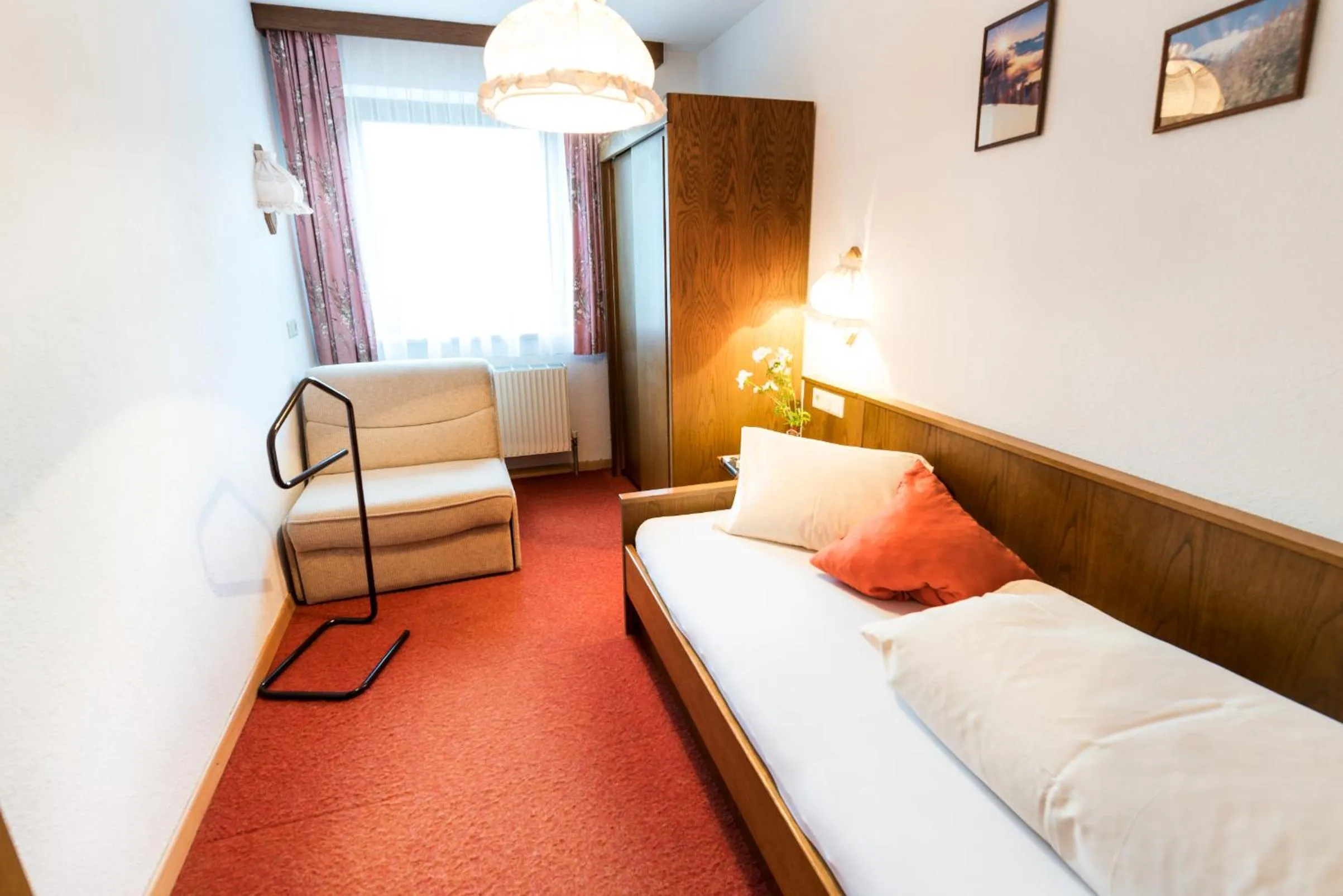 Seating area, Bed in "Quality Hosts Arlberg" Hotel-Gasthof Freisleben