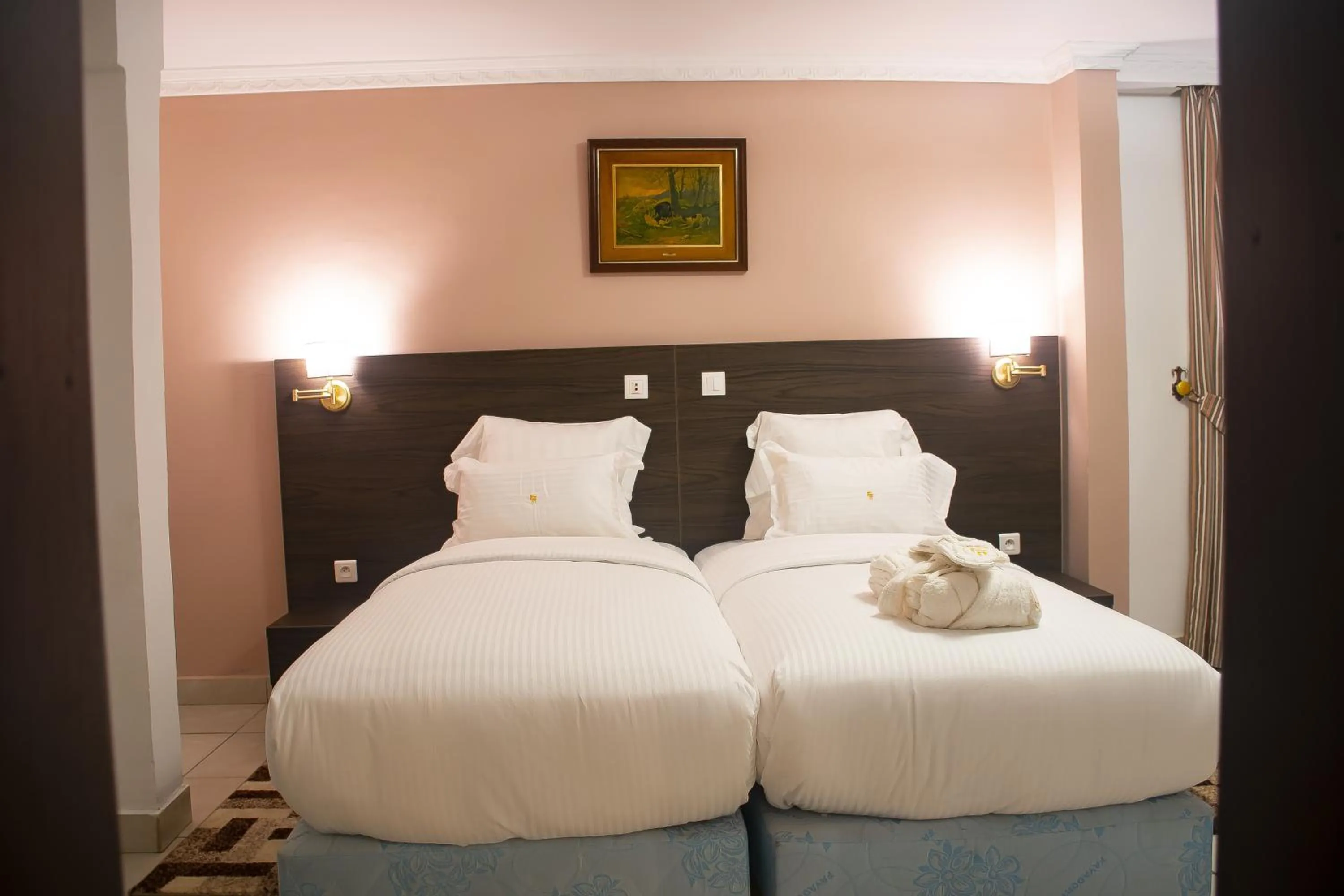 towels, Bed in FAYA Hotel