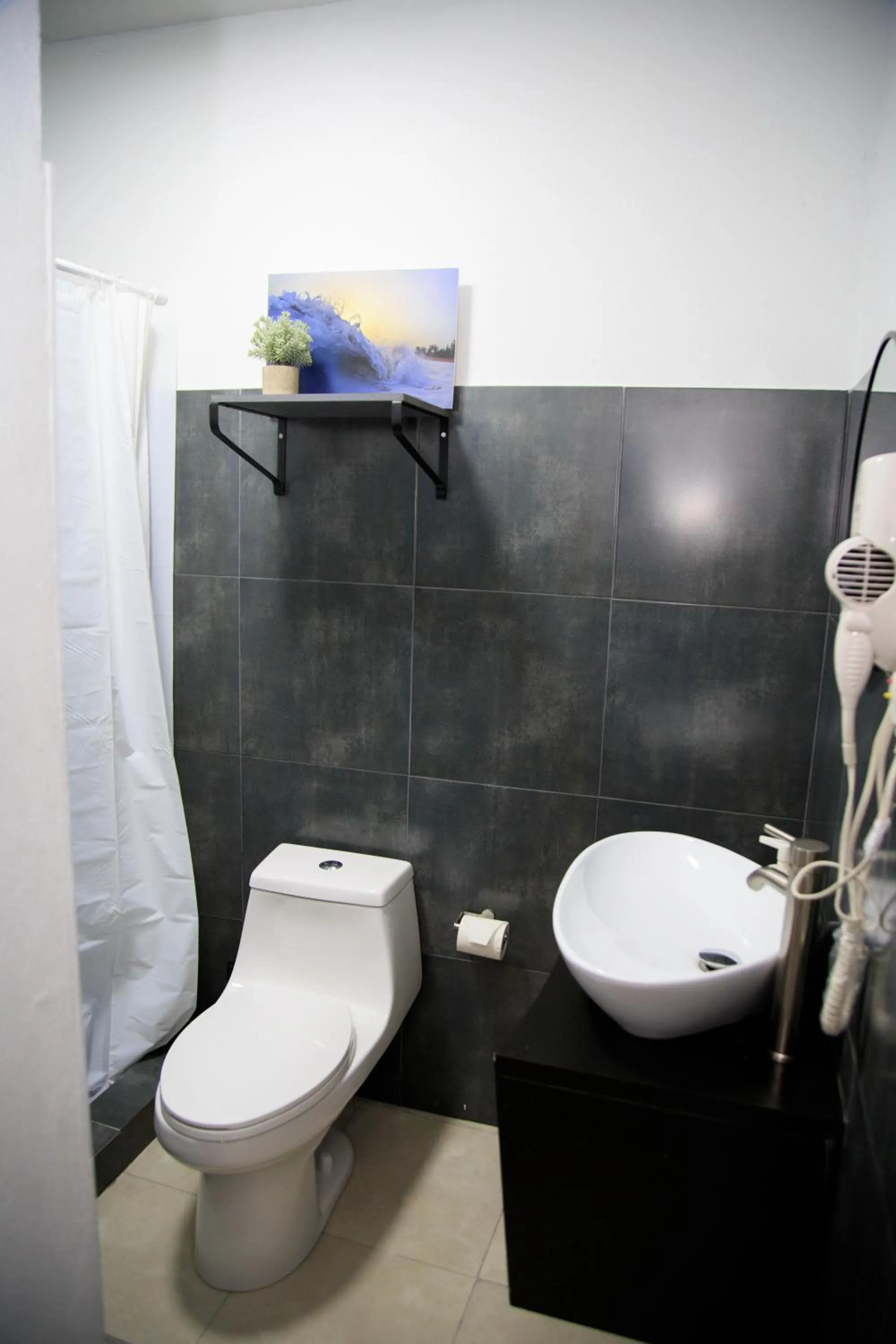 Toilet in Nomada Beach Hostel- Isla Verde