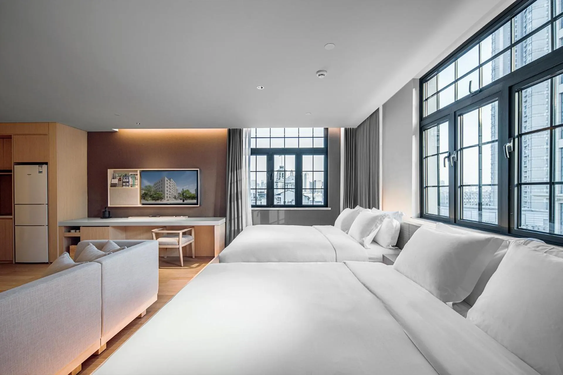 Bed in HOTEL ANDI Townscape Wuhan