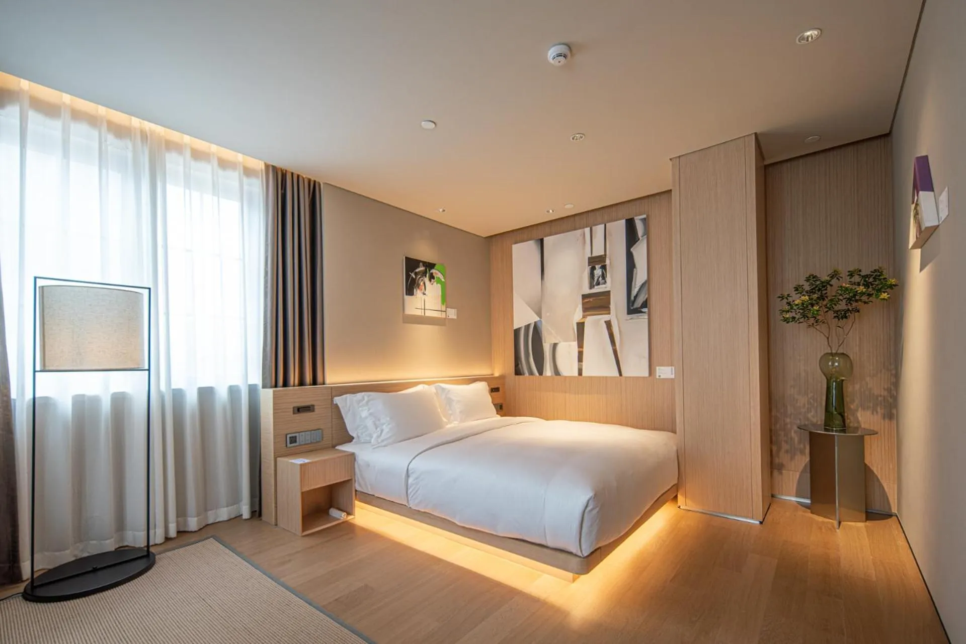 Bed in HOTEL ANDI Townscape Wuhan