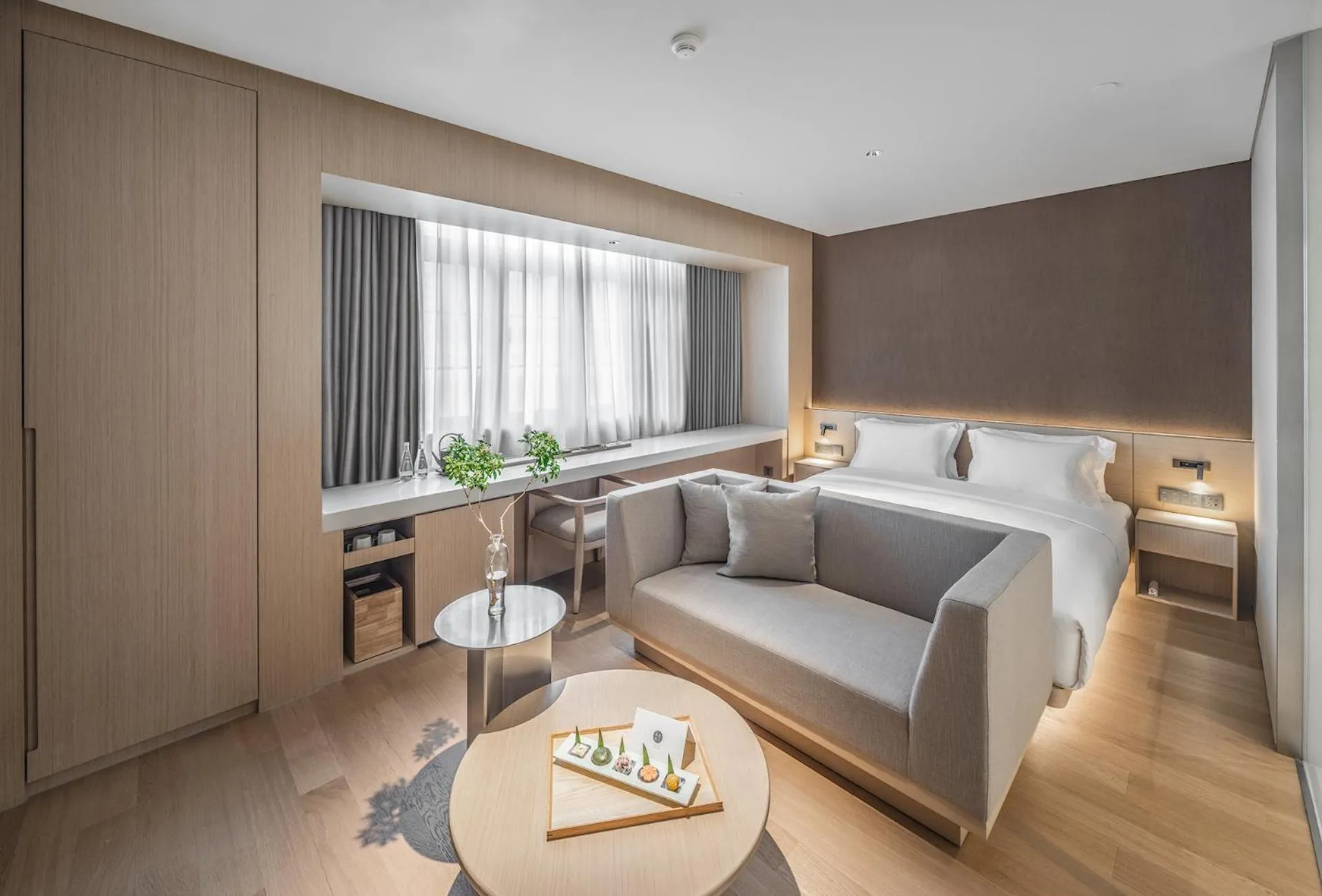 Bed in HOTEL ANDI Townscape Wuhan