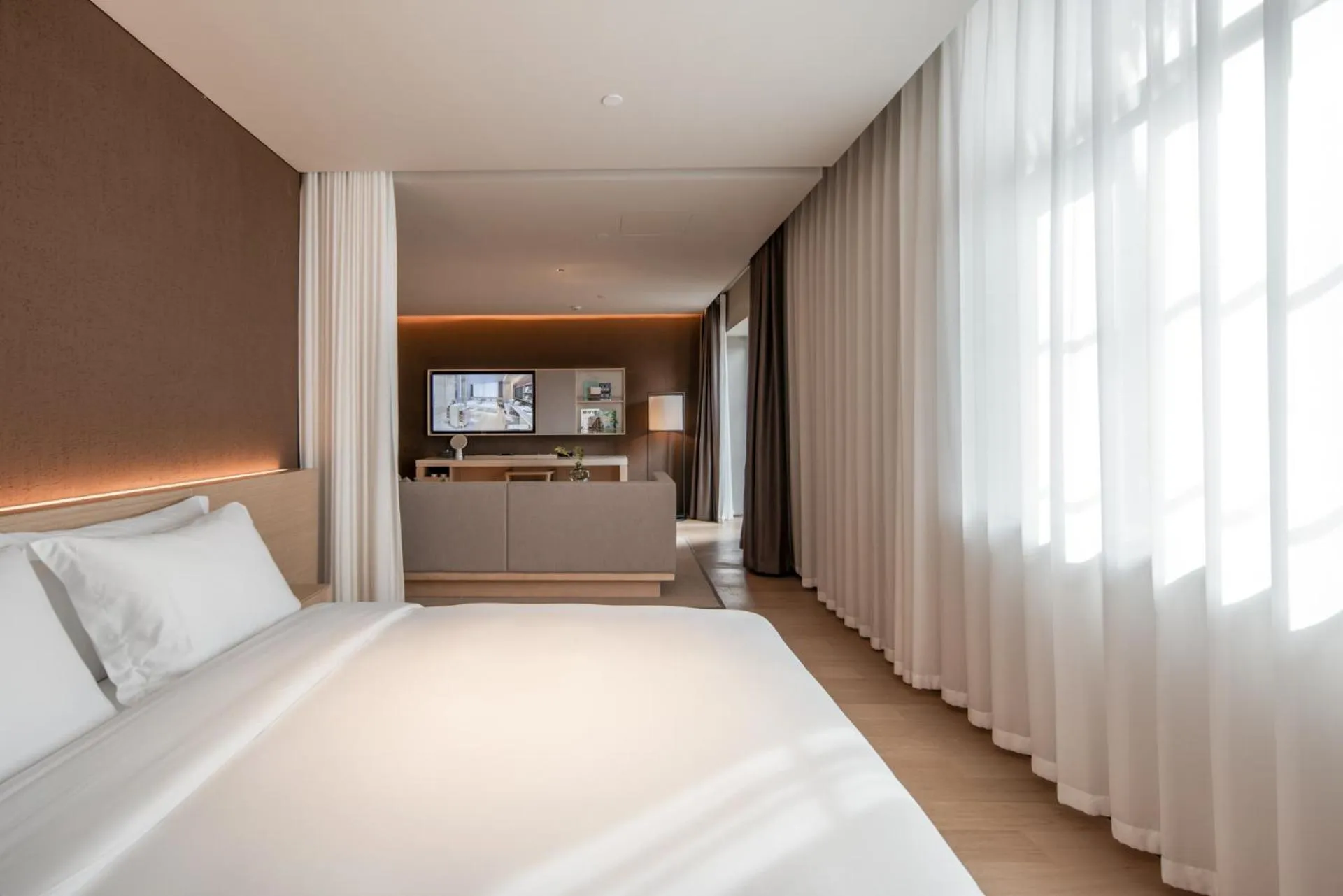 Bed in HOTEL ANDI Townscape Wuhan