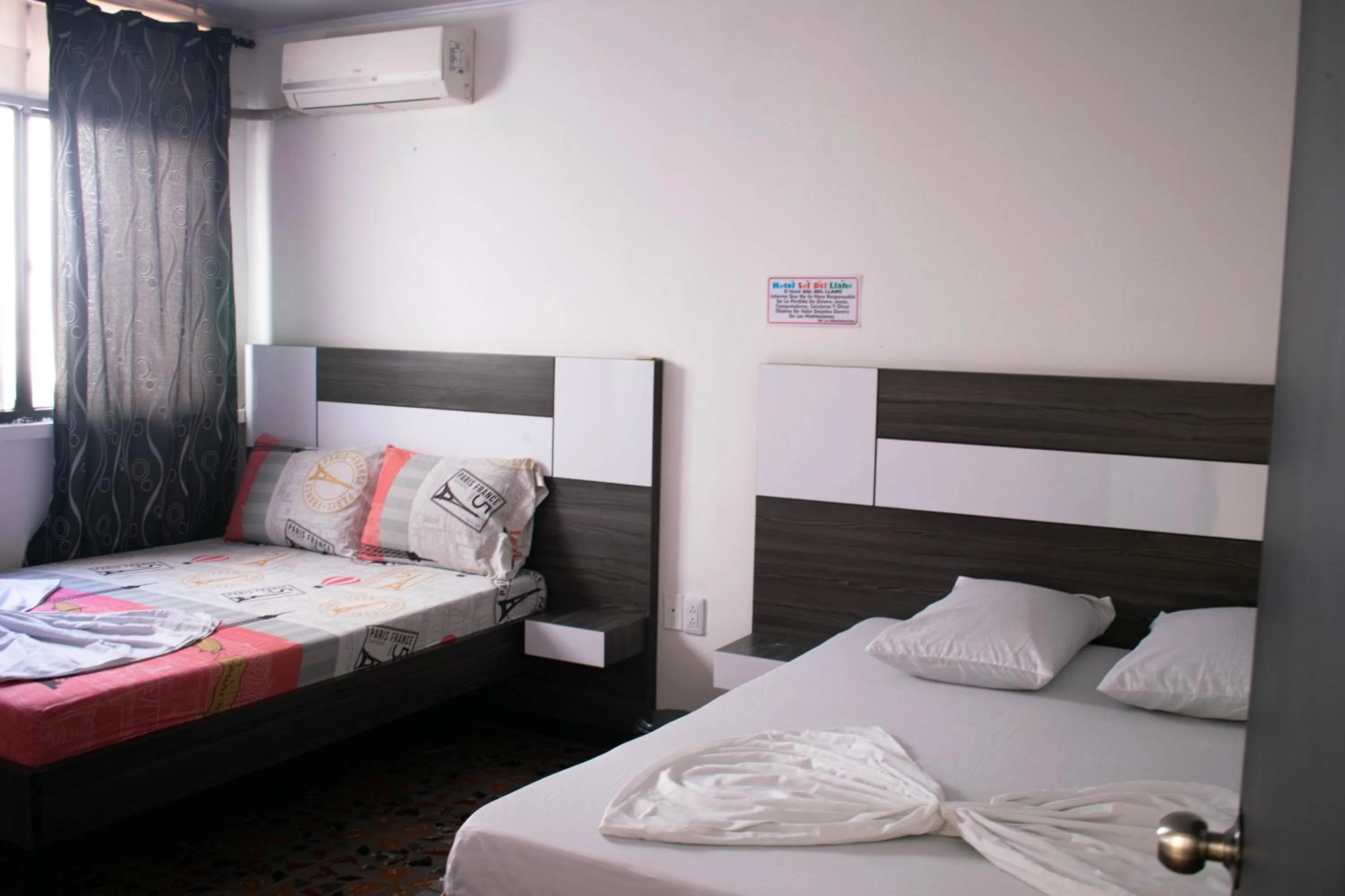 air conditioner, Bed in Hotel Sol Del LLano