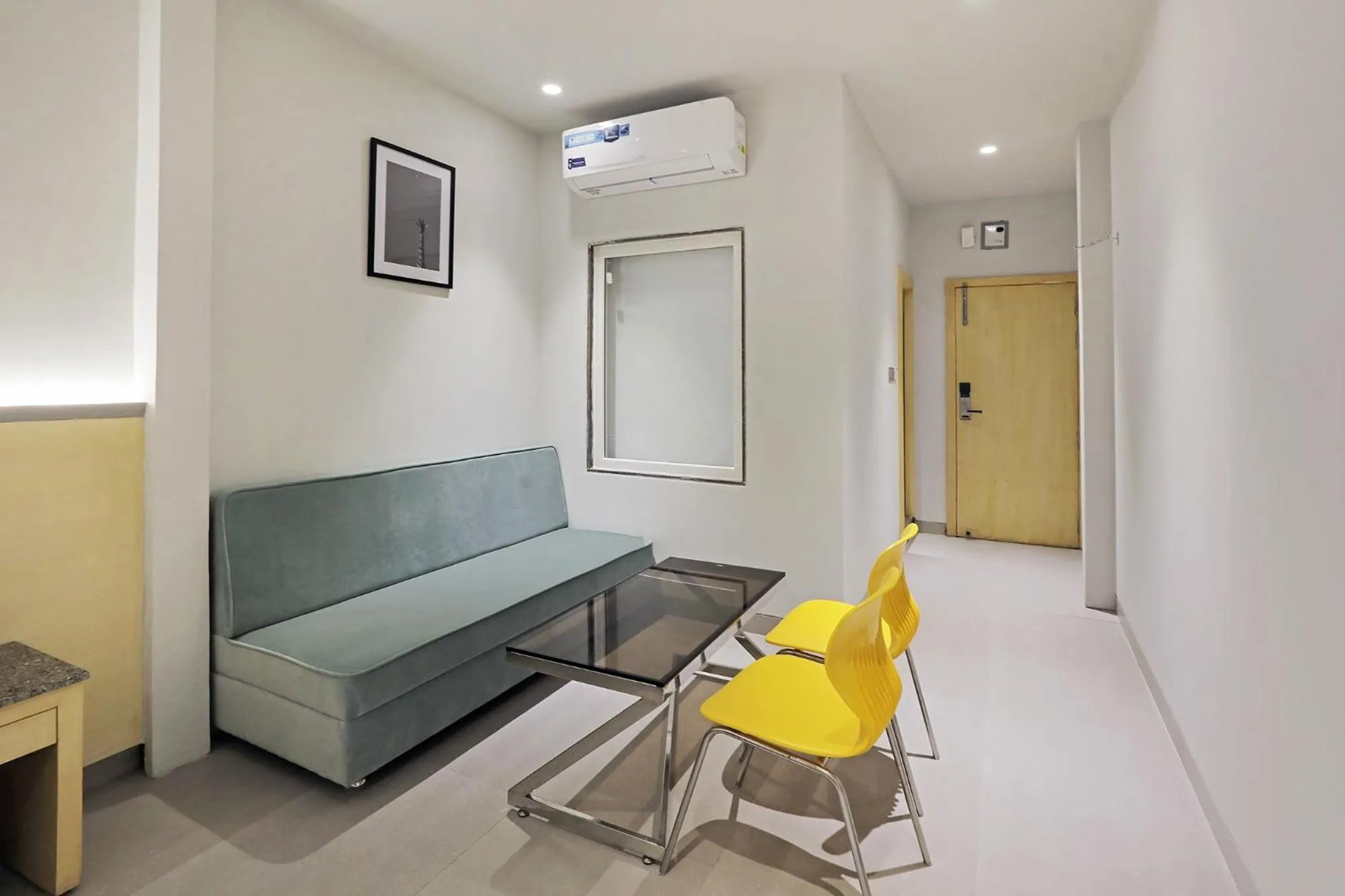 Seating area in FabHotel Yellow Courtyard