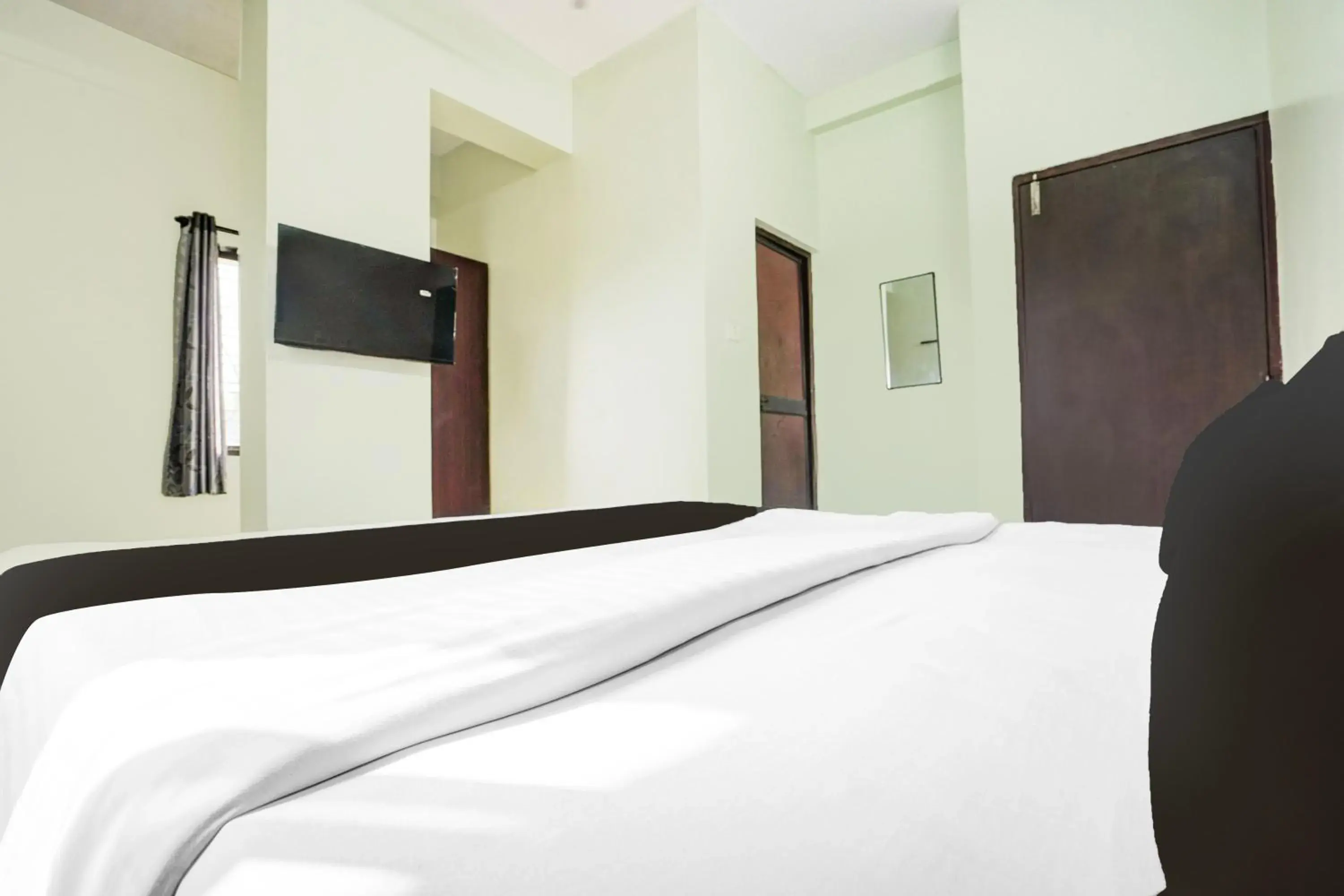 Bedroom, Bed in Super Hotel O Rajendra Nagar Hingna Road Bedroom, Bed in Super Hotel O Rajendra Nagar Hingna Road