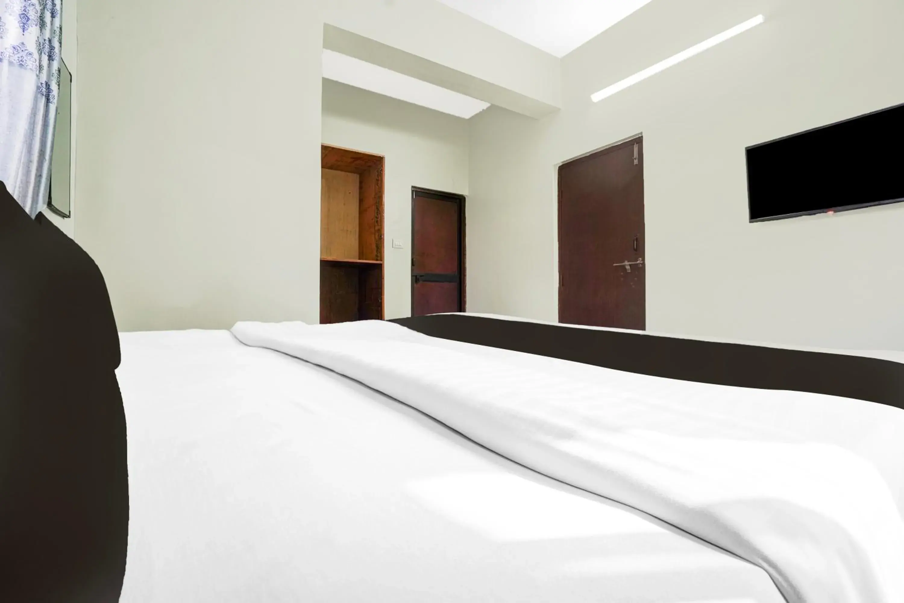 Bedroom, Bed in Super Hotel O Rajendra Nagar Hingna Road Bedroom, Bed in Super Hotel O Rajendra Nagar Hingna Road