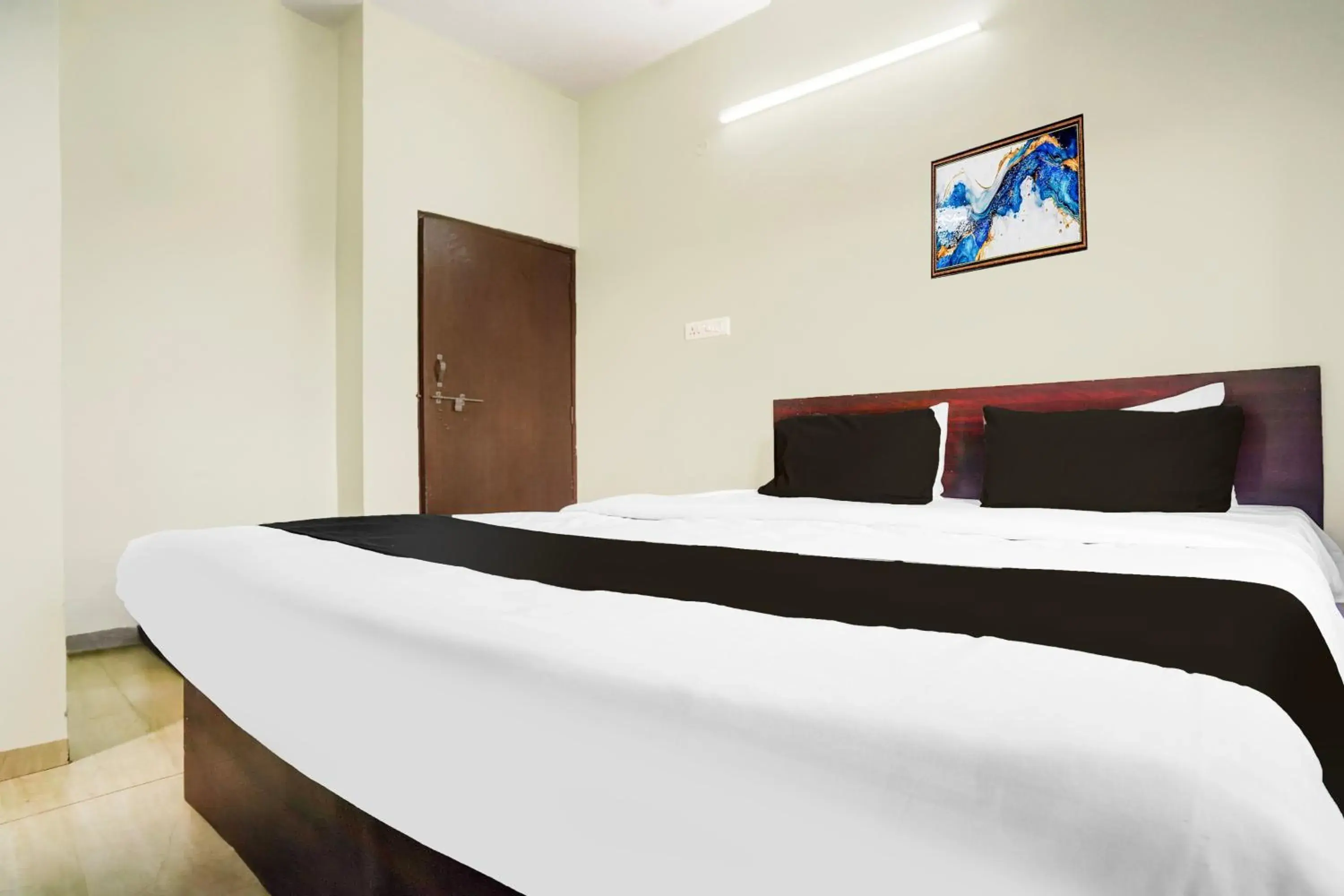 Bedroom, Bed in Super Hotel O Rajendra Nagar Hingna Road Bedroom, Bed in Super Hotel O Rajendra Nagar Hingna Road