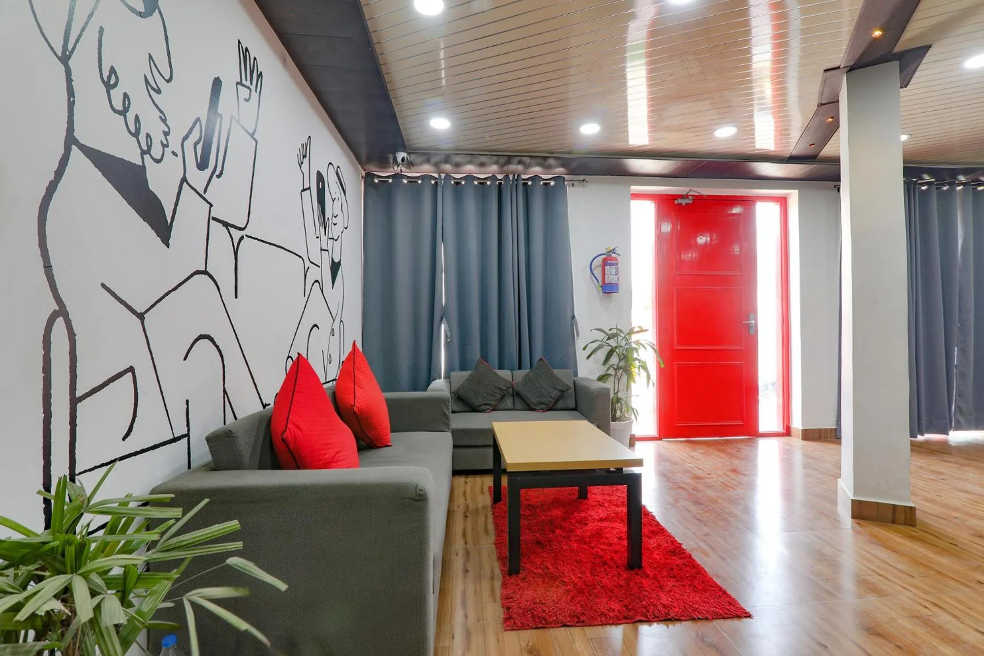 Seating area in FabHotel Super 3 Premium II