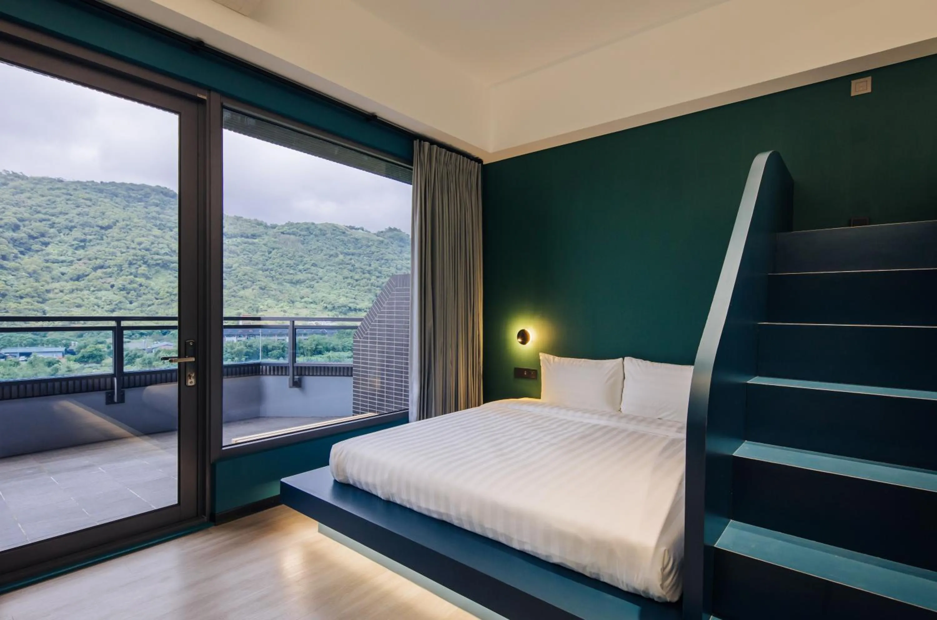 Photo of the whole room, Bed in OA HOTEL Wushih Marina