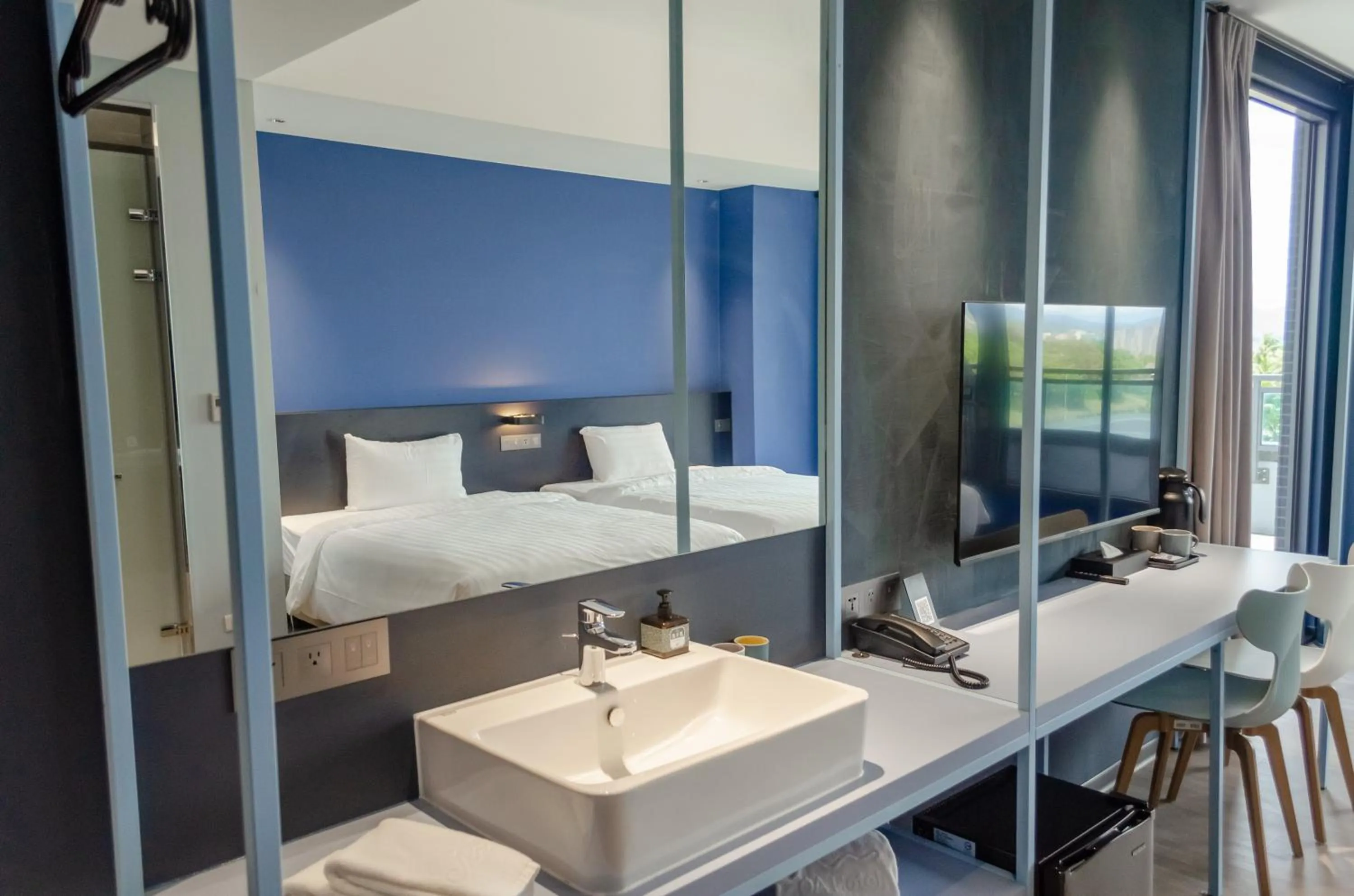 Photo of the whole room, Bed in OA HOTEL Wushih Marina