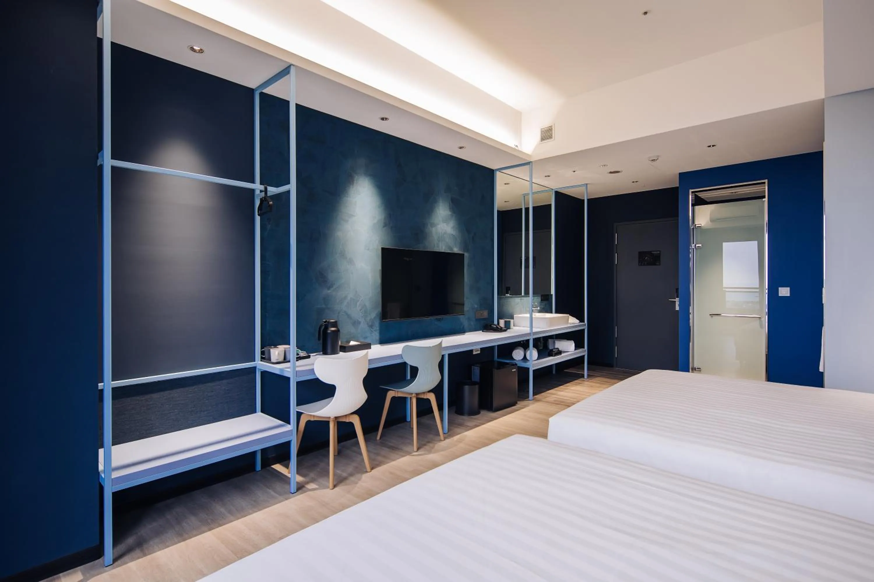 Photo of the whole room, Bed in OA HOTEL Wushih Marina