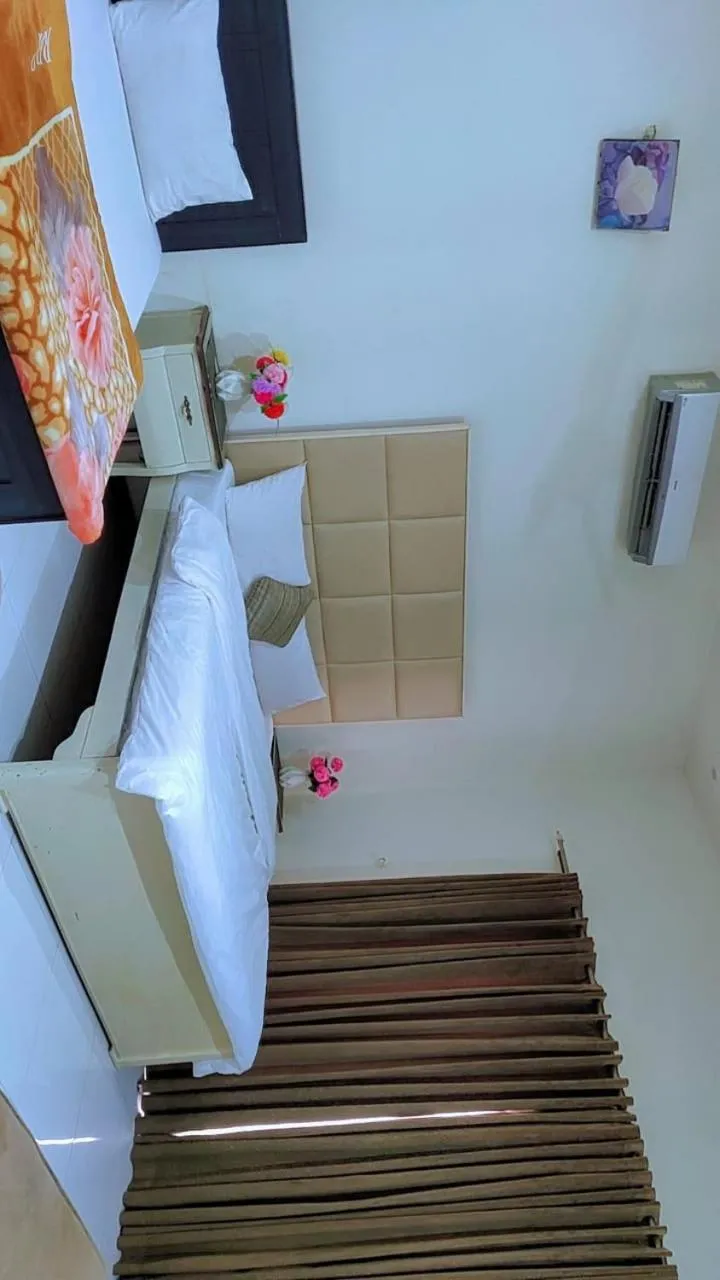 Bed in Comfyinn Guest House