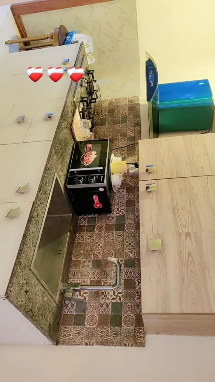 Kitchen or kitchenette in Comfyinn Guest House