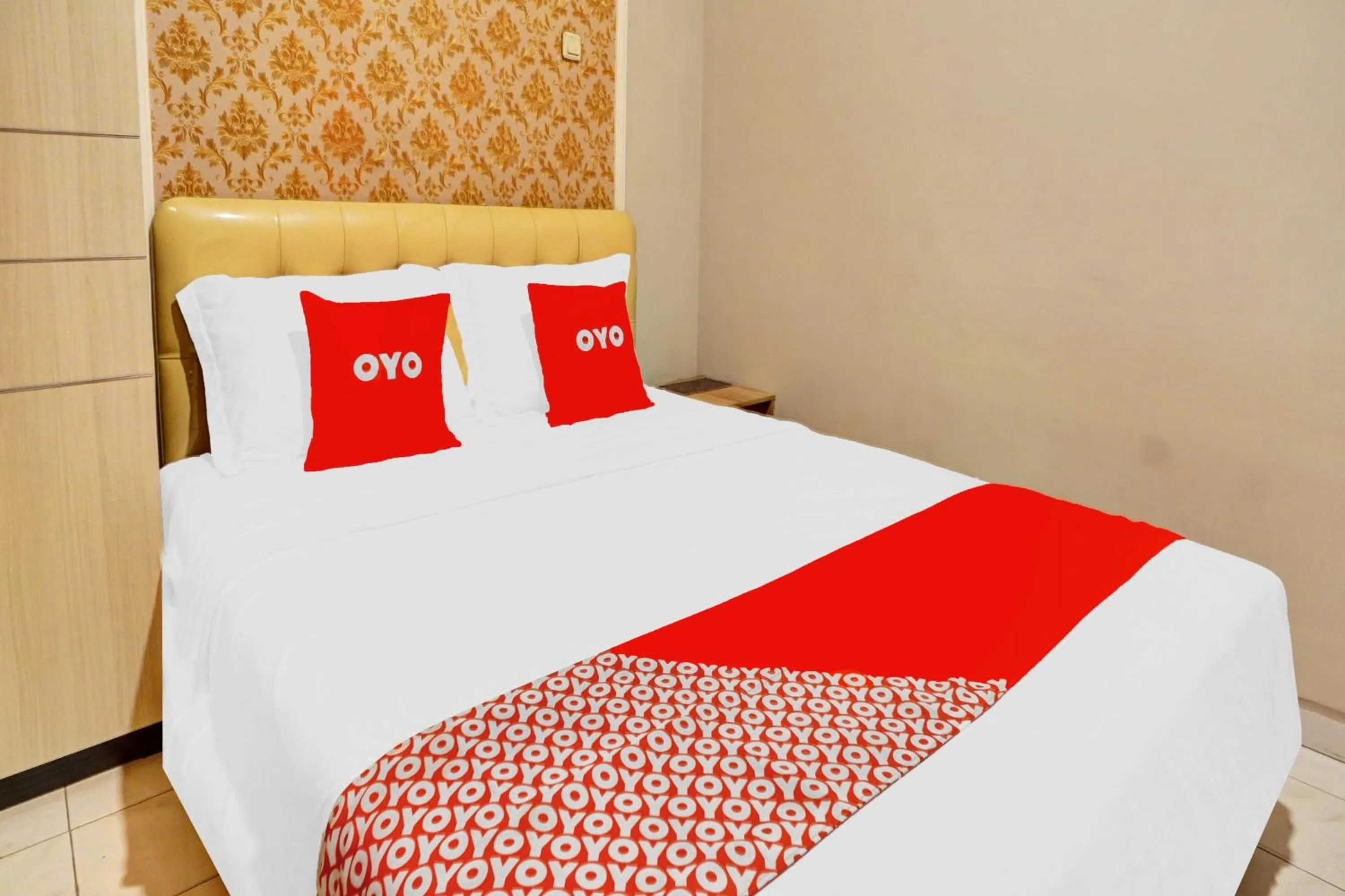 Bedroom in Hotel O Btc Guest House Syariah